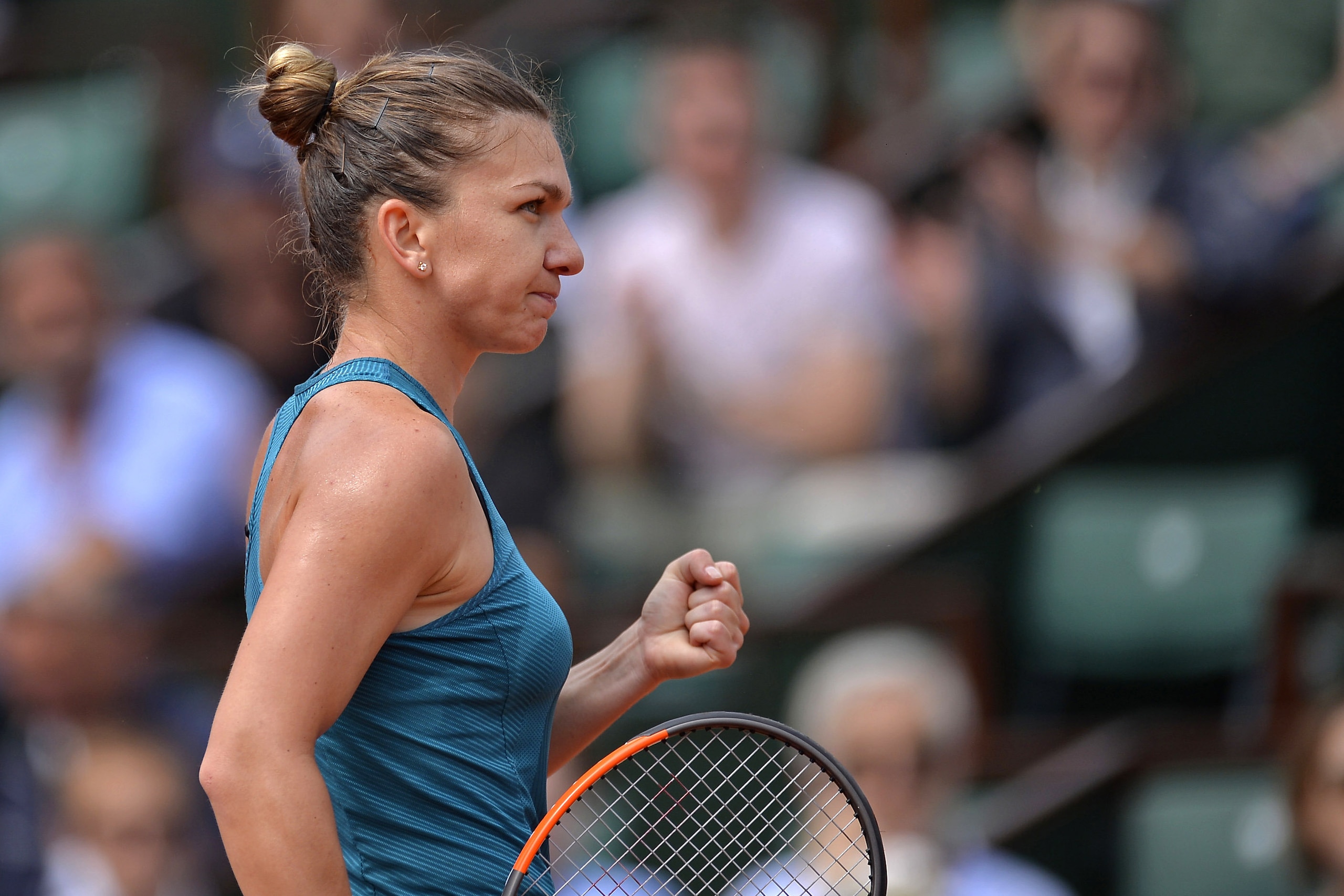 PARIS, FRANCE - JUNE 04:  Simona Halep of Romania reacts during her women's singles fourth round match against Elise Mertens of Belgium on day 9 of the 2018 French Open at Roland Garros on June 4, 2018 in Paris, France.  (Photo by Aurelien Meunier/Getty I