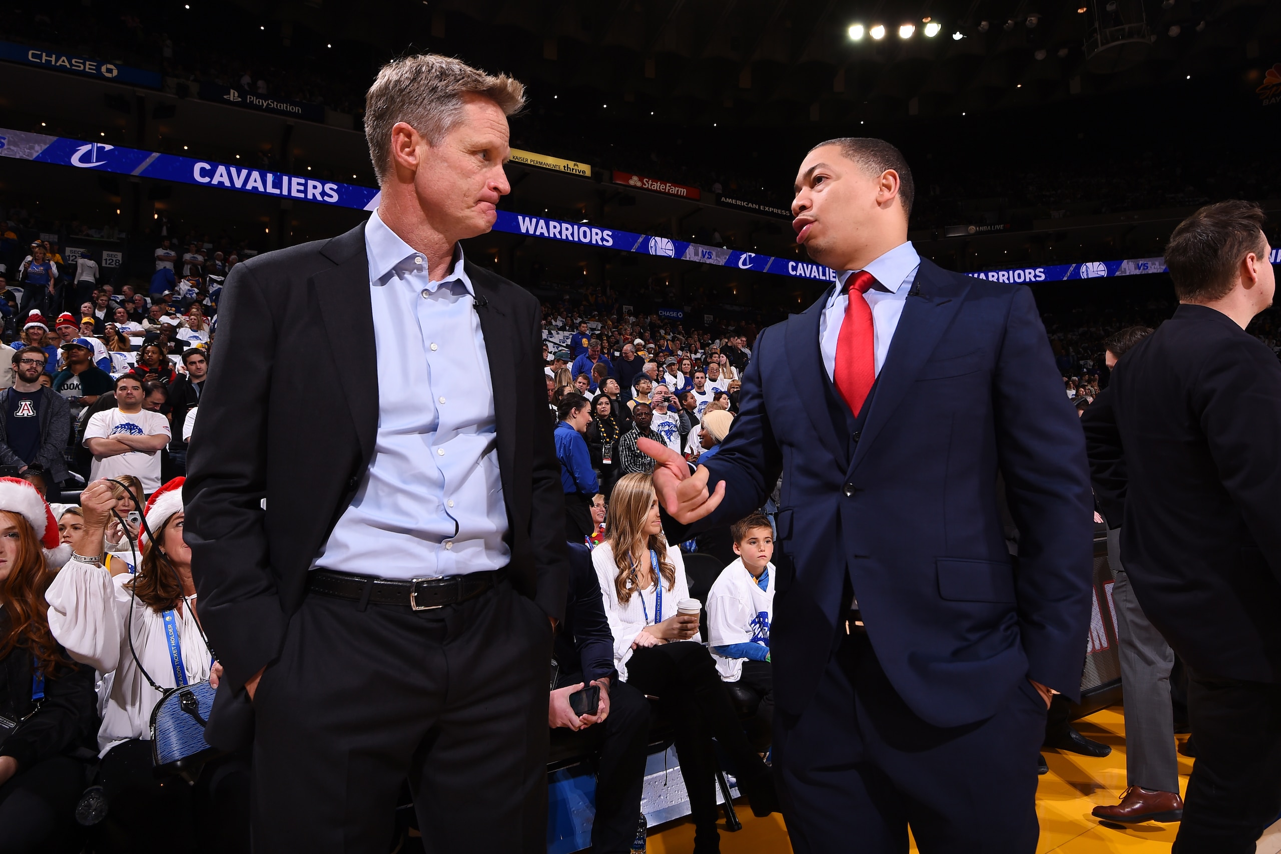 OAKLAND, CA - DECEMBER 25: Head Coach Steve Kerr of the Golden State Warriors and Head Coach Tyronn Lue of the Cleveland Cavaliers talk during the game between the two teams on December 25, 2017 at ORACLE Arena in Oakland, California. NOTE TO USER: User e OAKLAND, CA - DECEMBER 25: Head Coach Steve Kerr of the Golden State Warriors and Head Coach Tyronn Lue of the Cleveland Cavaliers talk during the game between the two teams on December 25, 2017 at ORACLE Arena in Oakland, California. NOTE TO USER: User e