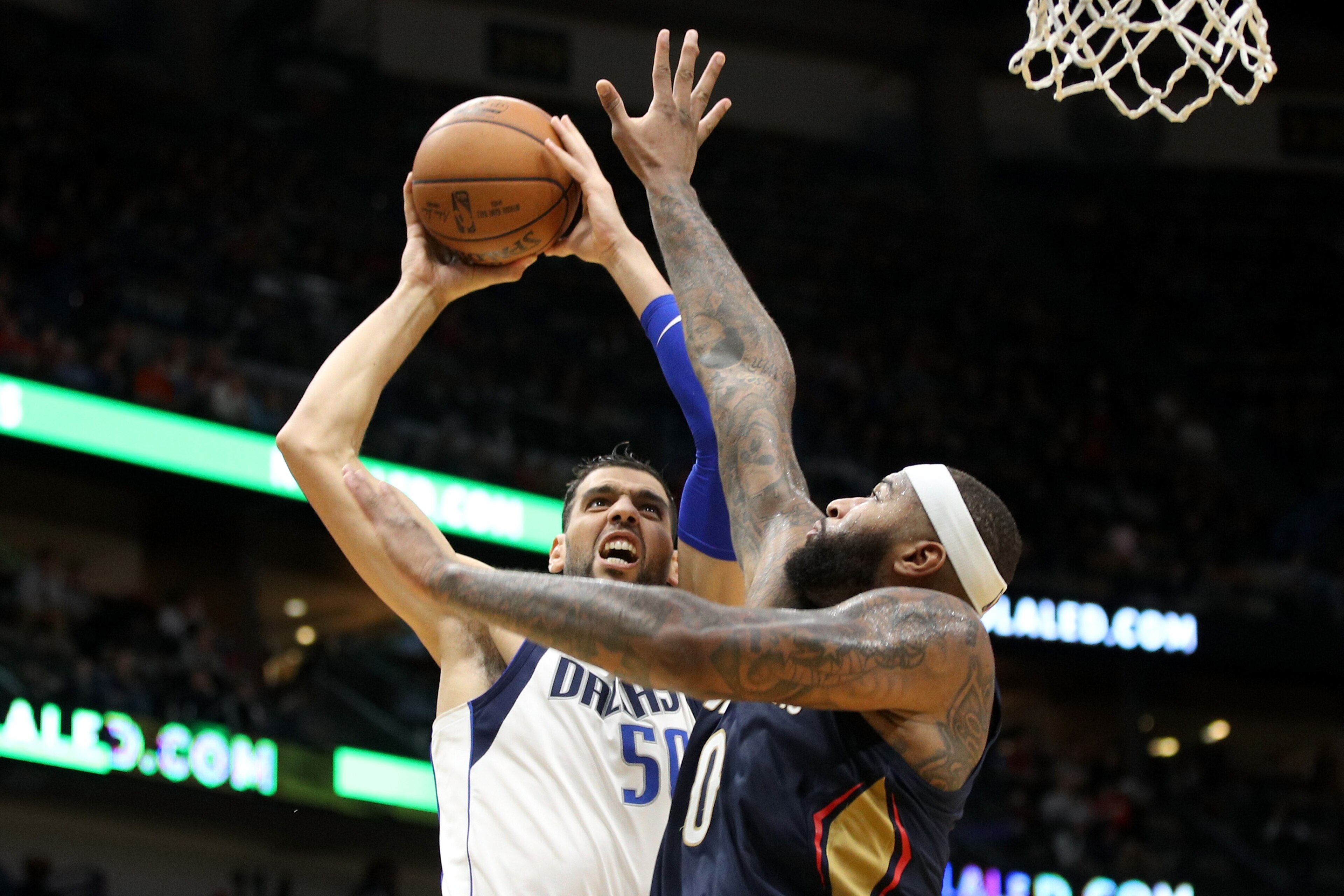 NEW ORLEANS, LA - DECEMBER 29: Salah Mejri #50 of the Dallas Mavericks shoots the ball over DeMarcus Cousins #0 of the New Orleans Pelicans at Smoothie King Center on December 29, 2017 in New Orleans, Louisiana. (Photo by Chris Graythen/Getty Images) NEW ORLEANS, LA - DECEMBER 29: Salah Mejri #50 of the Dallas Mavericks shoots the ball over DeMarcus Cousins #0 of the New Orleans Pelicans at Smoothie King Center on December 29, 2017 in New Orleans, Louisiana. (Photo by Chris Graythen/Getty Images)