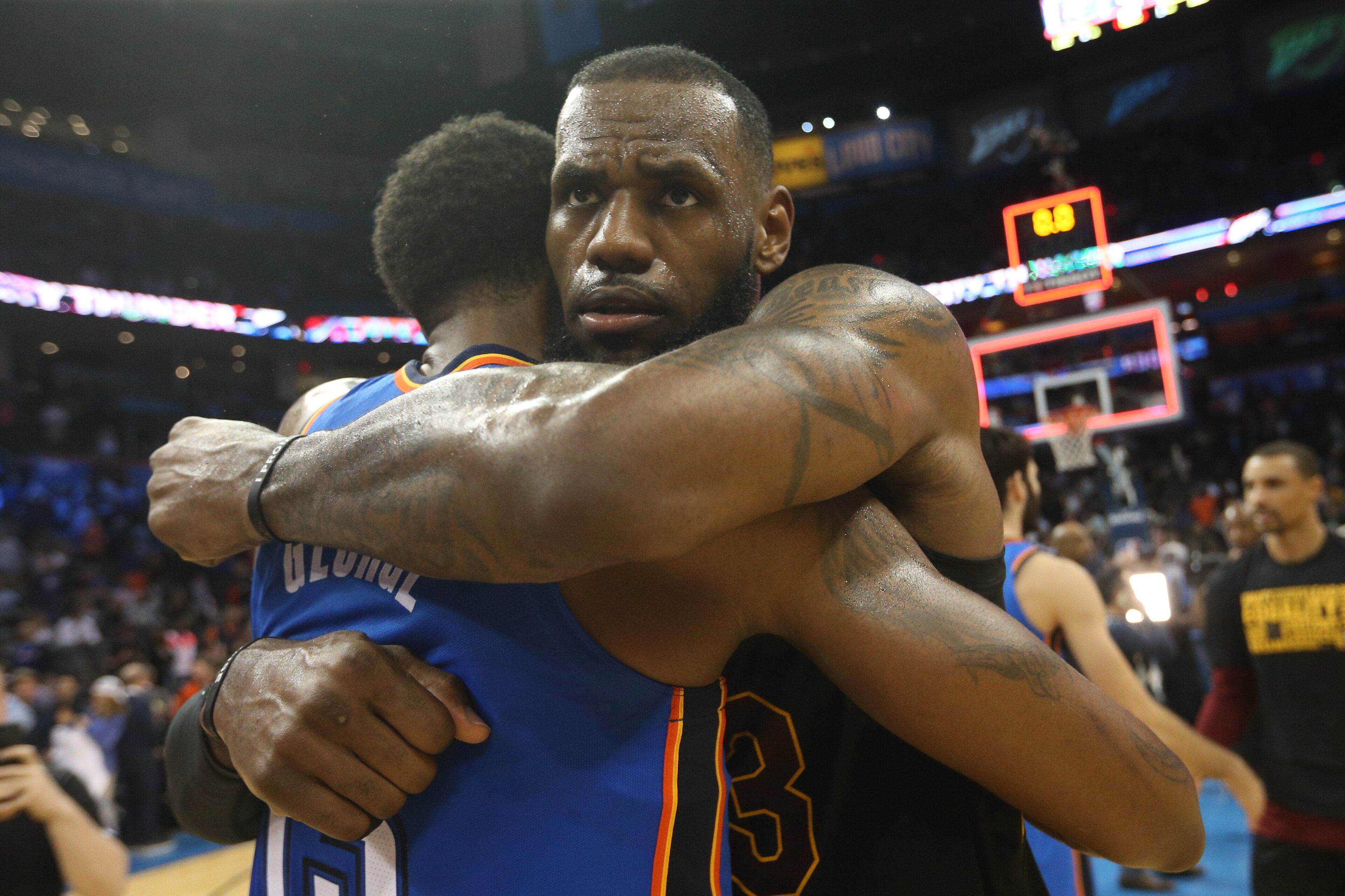 OKLAHOMA CITY, OK - FEBRUARY 13:  LeBron James #23 of the Cleveland Cavaliers and Paul George #13 of the Oklahoma City Thunder hug after the game on February 13, 2018 at Chesapeake Energy Arena in Oklahoma City, Oklahoma. NOTE TO USER: User expressly ackn