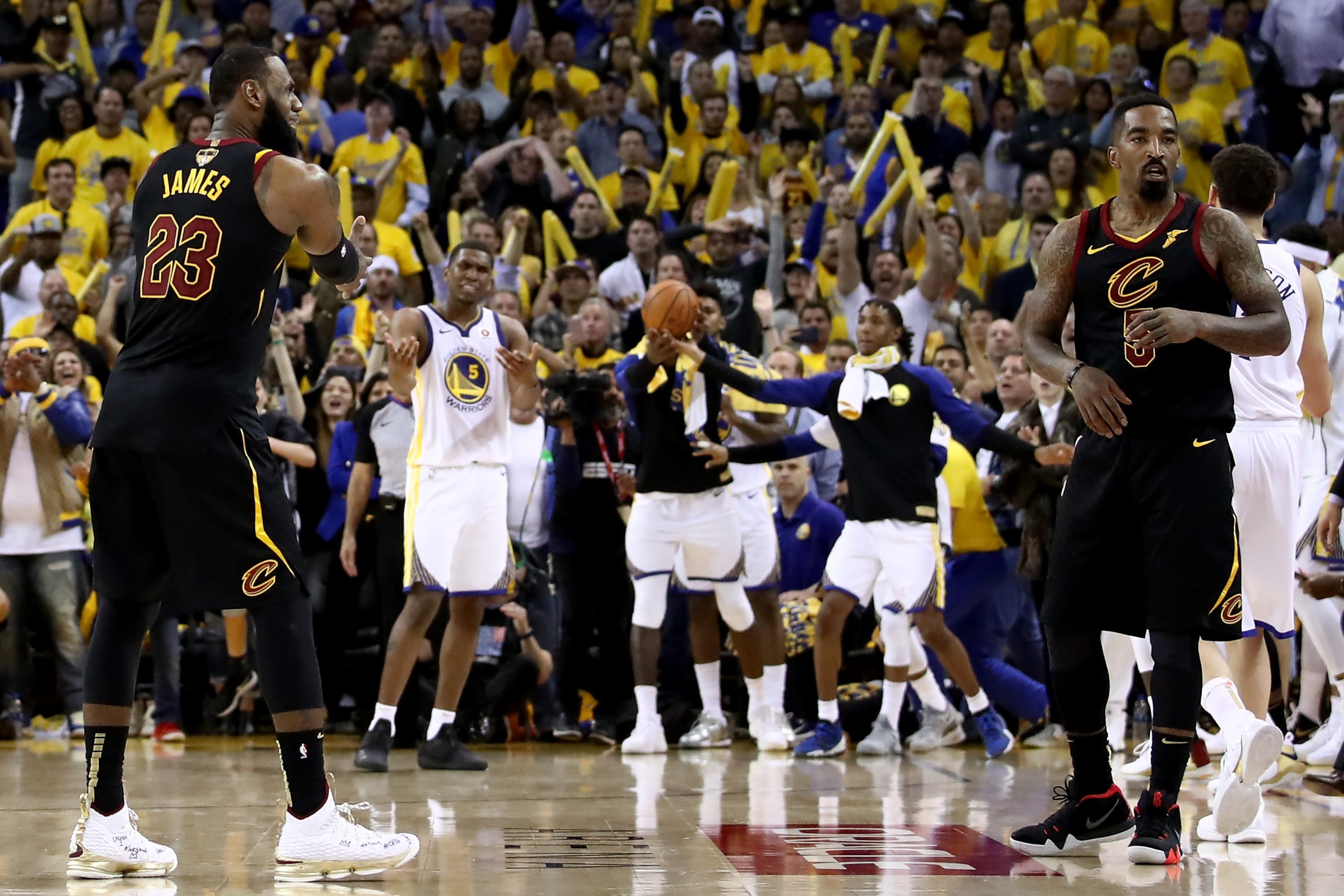 OAKLAND, CA - MAY 31: LeBron James #23 and JR Smith #5 of the Cleveland Cavaliers react as time expries in regulation against the Golden State Warriors  in Game 1 of the 2018 NBA Finals at ORACLE Arena on May 31, 2018 in Oakland, California. NOTE TO USER: