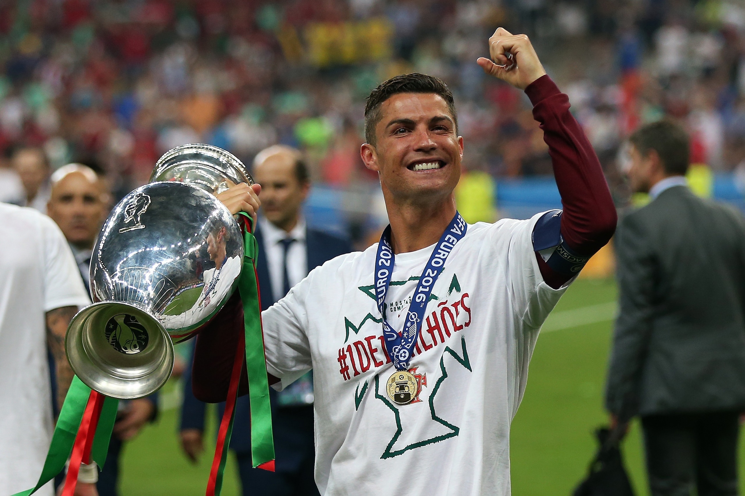 PARIS, FRANCE - JULY 10: Cristiano Ronaldo of Portugal celebrates with the trophy following the UEFA Euro 2016 Final match between Portugal and France at Stade de France on July 10, 2016 in Paris, France. (Photo by Chris Brunskill Ltd/Getty Images)