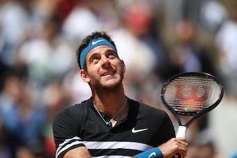 Argentina's Juan Martin del Potro celebrates after victory over Croatia's Marin Cilic at the end of their men's singles quarter-final match on day twelve of The Roland Garros 2018 French Open tennis tournament in Paris on June 7, 2018. (Photo by Christoph