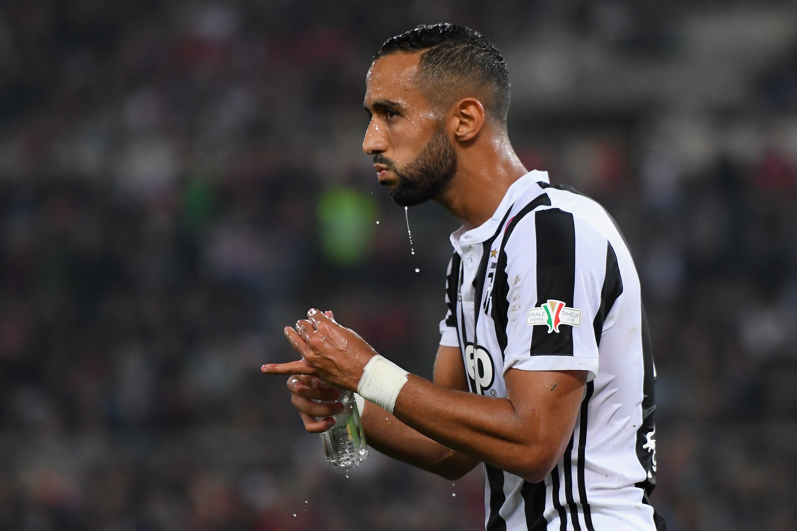 ROME, ITALY - MAY 09: El Mouttaqui Benatia of Juventus drinks during the TIM Cup  Final between Juventus and AC Milan at Stadio Olimpico on May 9, 2018 in Rome, Italy.  (Photo by Alessandro Sabattini/Getty Images)
