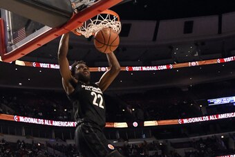 CHICAGO, IL - MARCH 29: Mitchell Robinson #22 of the boys east team  dunks the ball during the 2017 McDonalds's All American Game on March 29, 2017 at the United Center in Chicago, Illinois. The West Team won 109-107. (Photo by David Banks/Getty Images)