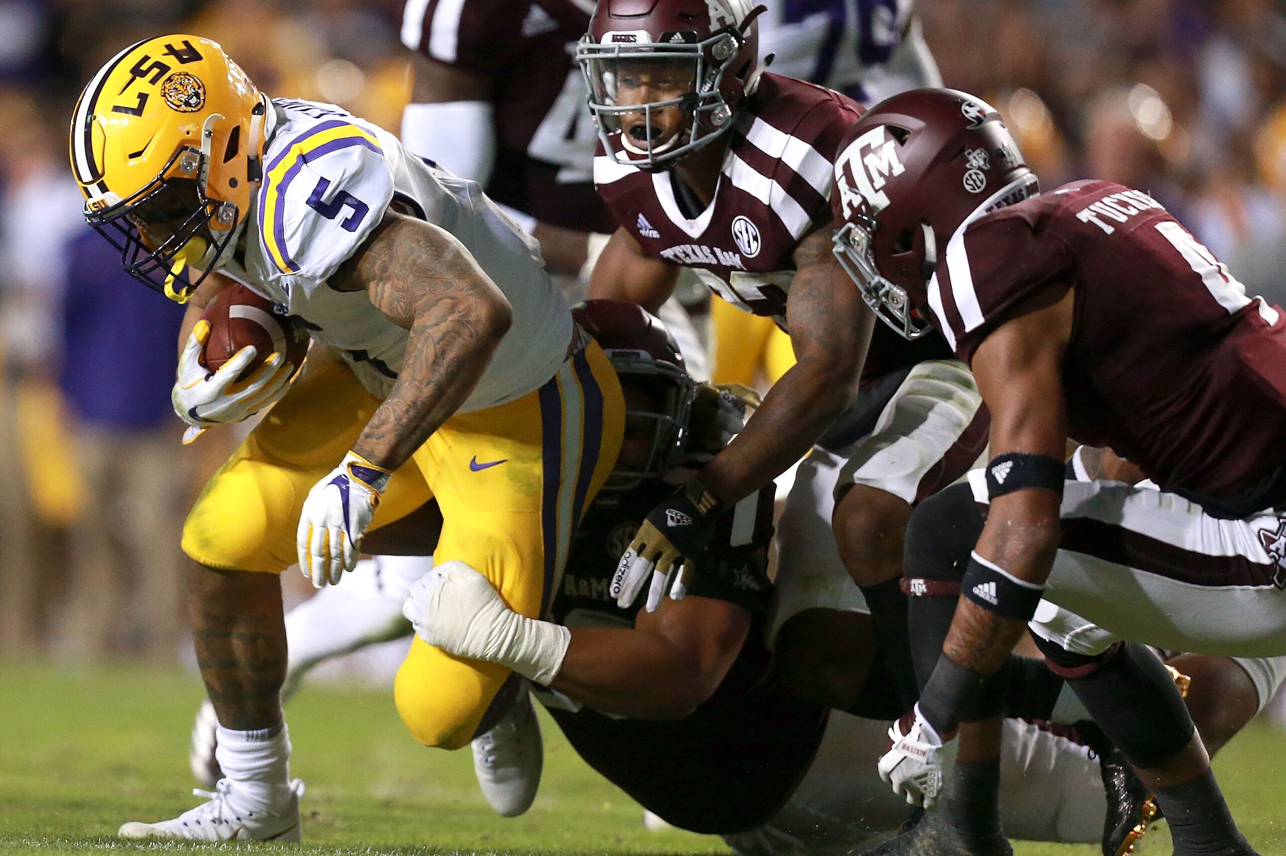 BATON ROUGE, LA - NOVEMBER 25:  Derrius Guice #5 of the LSU Tigers runs the ball during the first half of a game against the Texas A&M Aggies at Tiger Stadium on November 25, 2017 in Baton Rouge, Louisiana.  (Photo by Sean Gardner/Getty Images)