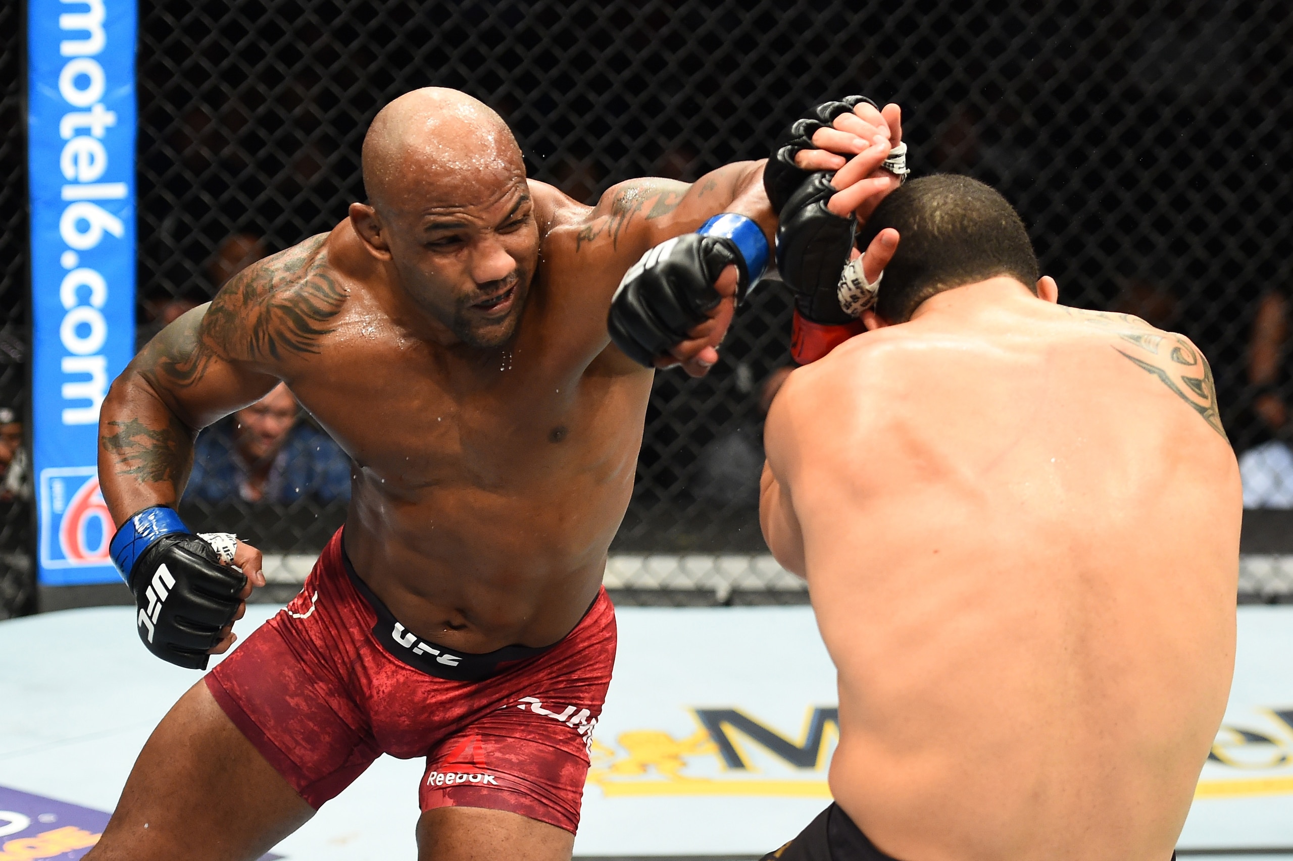 CHICAGO, ILLINOIS - JUNE 09: (L-R) Yoel Romero of Cuba throws an elbow against Robert Whittaker of New Zealand in their middleweight fight during the UFC 225 event at the United Center on June 9, 2018 in Chicago, Illinois. (Photo by Josh Hedges/Zuffa LLC CHICAGO, ILLINOIS - JUNE 09: (L-R) Yoel Romero of Cuba throws an elbow against Robert Whittaker of New Zealand in their middleweight fight during the UFC 225 event at the United Center on June 9, 2018 in Chicago, Illinois. (Photo by Josh Hedges/Zuffa LLC