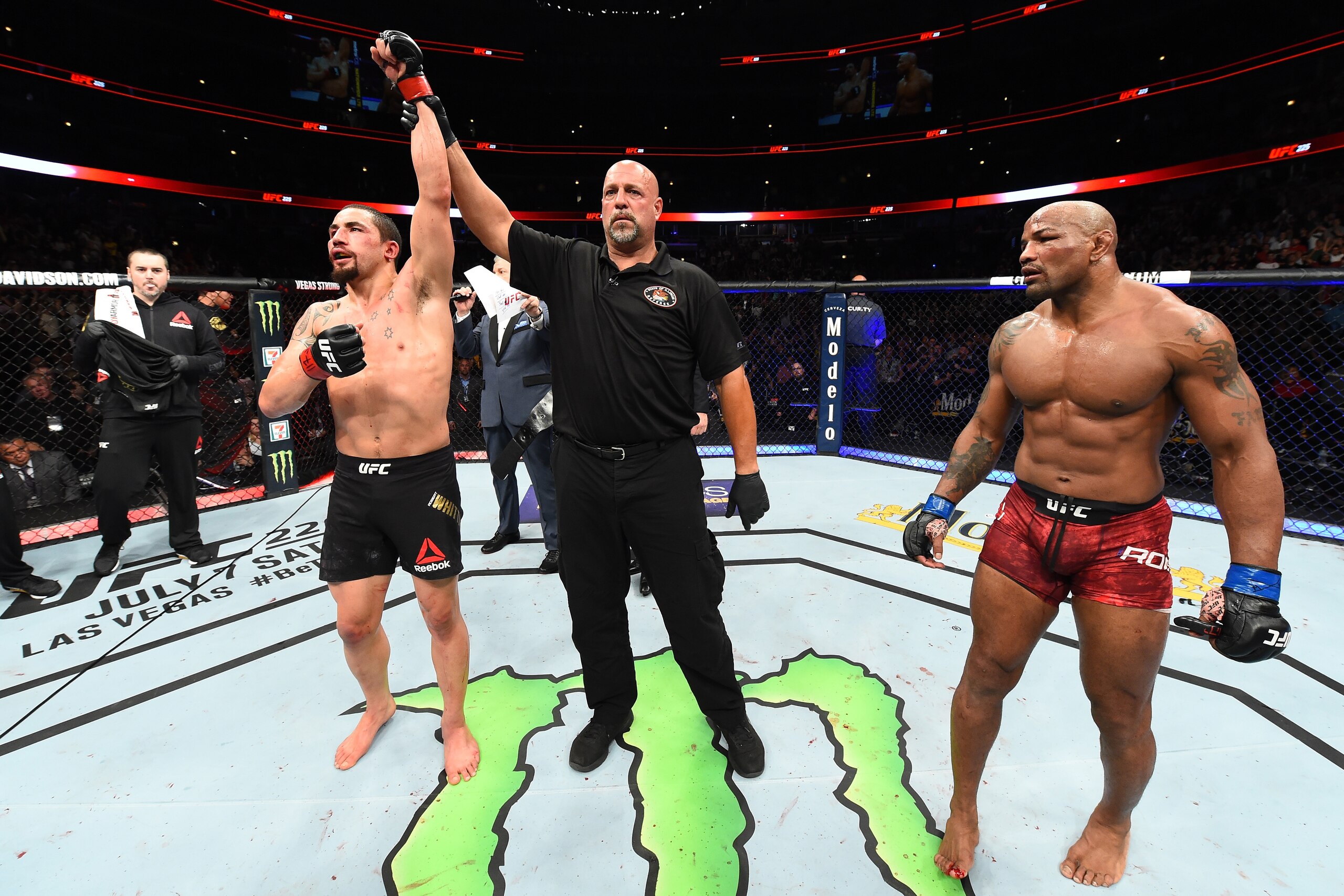 CHICAGO, ILLINOIS - JUNE 09: (L-R) Robert Whittaker of New Zealand celebrates after defeating Yoel Romero of Cuba by split decision in their middleweight fight during the UFC 225 event at the United Center on June 9, 2018 in Chicago, Illinois. (Photo by CHICAGO, ILLINOIS - JUNE 09: (L-R) Robert Whittaker of New Zealand celebrates after defeating Yoel Romero of Cuba by split decision in their middleweight fight during the UFC 225 event at the United Center on June 9, 2018 in Chicago, Illinois. (Photo by