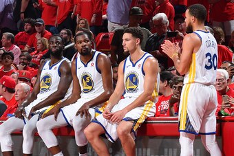 HOUSTON, TX - MAY 28: Draymond Green #23, Kevin Durant #35, Klay Thompson #11, and Stephen Curry #30 of the Golden State Warriors look on in Game Seven of the Western Conference Finals against the Houston Rockets during the 2018 NBA Playoffs on May 28, 20