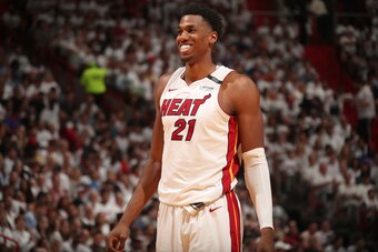 MIAMI, FL - APRIL 21: Hassan Whiteside #21 of the Miami Heat looks on in Game Four of the Eastern Conference Quarterfinals against the Philadelphia 76ers during the 2018 NBA Playoffs on April 21, 2018 at American Airlines Arena in Miami, Florida. NOTE TO 