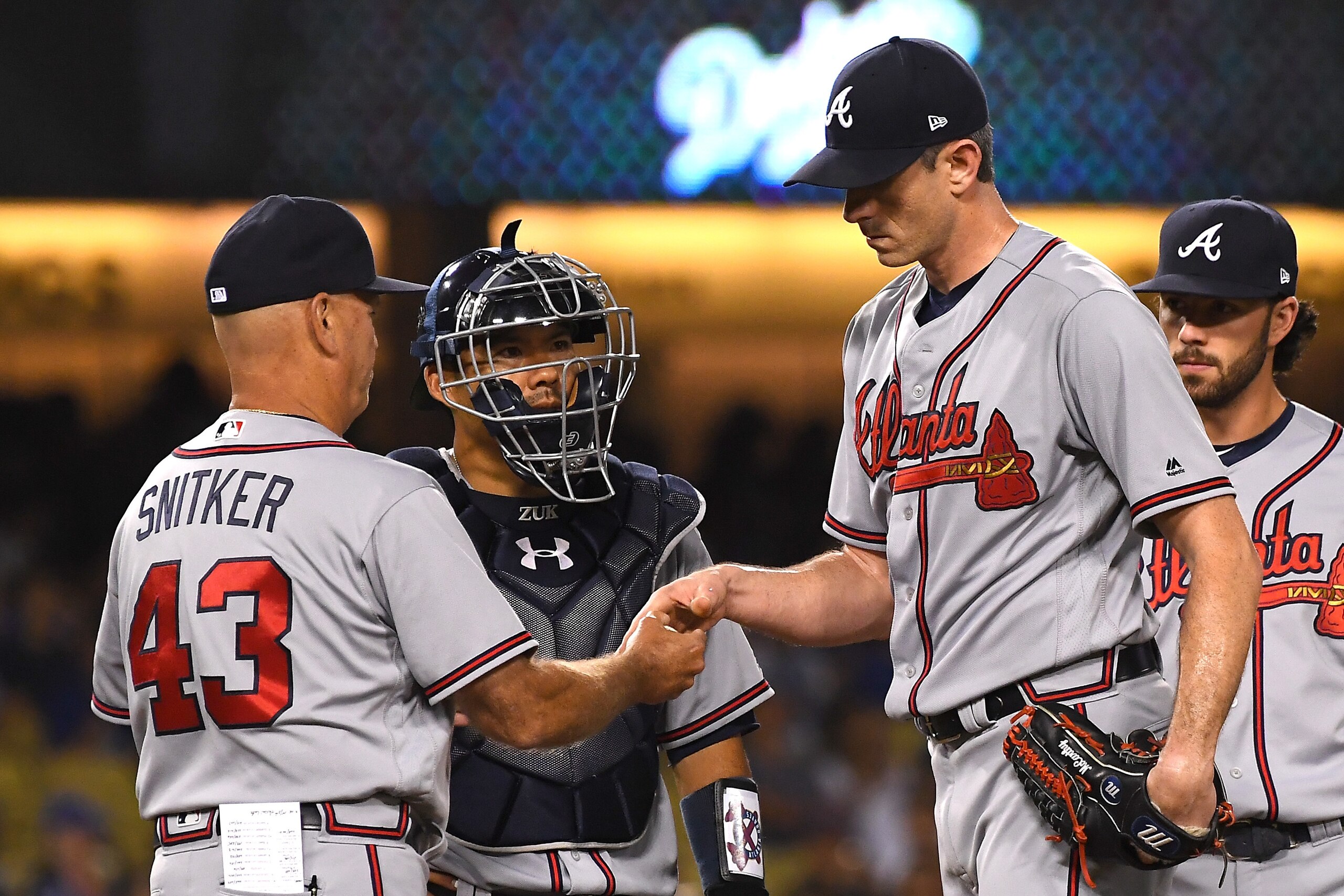 LOS ANGELES, CA - JUNE 08:  Brandon McCarthy #32 of the Atlanta Braves is pulled from the game by coach Brian Snitker #43 in the fifth inning against the Los Angeles Dodgers at Dodger Stadium on June 8, 2018 in Los Angeles, California.  (Photo by Jayne Ka