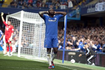 Chelsea's Belgian striker Romelu Lukaku (C) reacts after missing a goal during the English Premier League football match between Chelsea and Blackburn Rovers at Stamford Bridge in London on May 13, 2012. AFP PHOTO/MIGUEL MEDINA

RESTRICTED TO EDITORIAL US