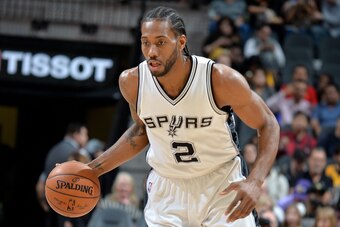 SAN ANTONIO, TX - JANUARY 12: Kawhi Leonard #2 of the San Antonio Spurs handles the ball against the Los Angeles Lakers on January 12, 2017 at the AT&T Center in San Antonio, Texas. NOTE TO USER: User expressly acknowledges and agrees that, by downloading