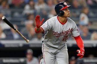 NEW YORK, NY - JUNE 13:  Juan Soto #22 of the Washington Nationals follows through on a seventh inning home run against the New York Yankees at Yankee Stadium on June 13, 2018 in the Bronx borough of New York City.  (Photo by Jim McIsaac/Getty Images)