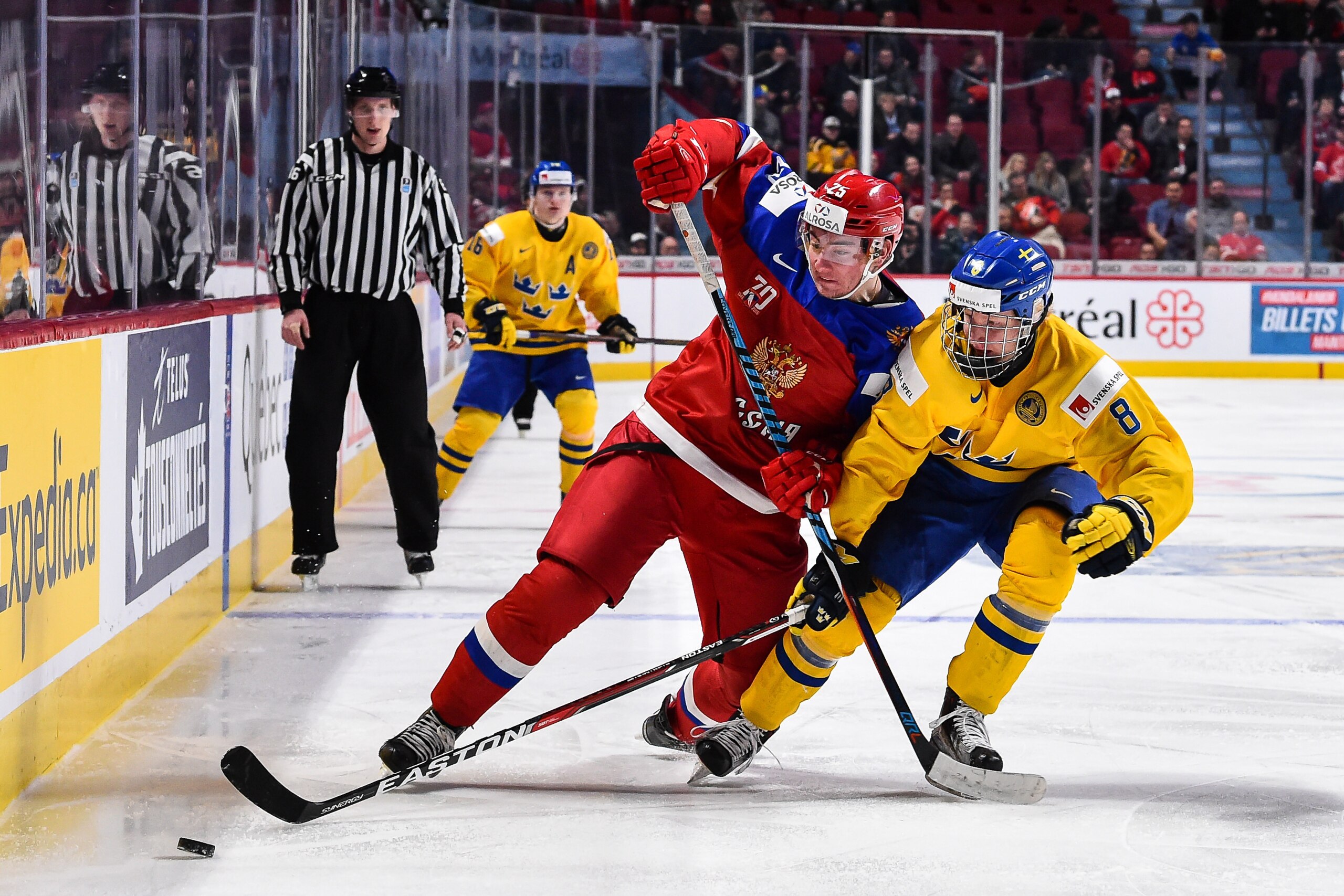 MONTREAL, QC - JANUARY 05: Yakov Trenin #25 of Team Russia and Rasmus Dahlin #8 of Team Sweden chase after the puck during the 2017 IIHF World Junior Championship bronze medal game at the Bell Centre on January 5, 2017 in Montreal, Quebec, Canada. (Photo MONTREAL, QC - JANUARY 05: Yakov Trenin #25 of Team Russia and Rasmus Dahlin #8 of Team Sweden chase after the puck during the 2017 IIHF World Junior Championship bronze medal game at the Bell Centre on January 5, 2017 in Montreal, Quebec, Canada. (Photo