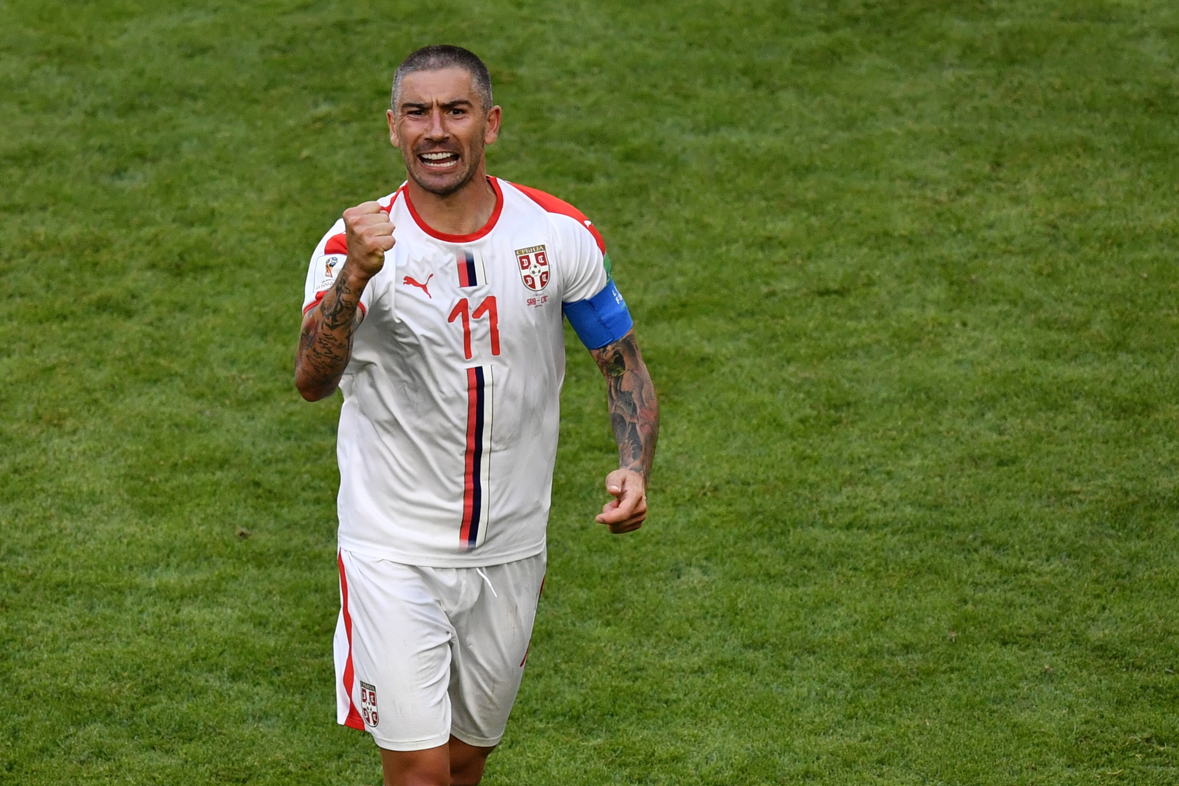 TOPSHOT - Serbia's defender Aleksandar Kolarov celebrates after scoring during the Russia 2018 World Cup Group E football match between Costa Rica and Serbia at the Samara Arena in Samara on June 17, 2018. (Photo by Fabrice COFFRINI / AFP) / RESTRICTED TO TOPSHOT - Serbia's defender Aleksandar Kolarov celebrates after scoring during the Russia 2018 World Cup Group E football match between Costa Rica and Serbia at the Samara Arena in Samara on June 17, 2018. (Photo by Fabrice COFFRINI / AFP) / RESTRICTED TO