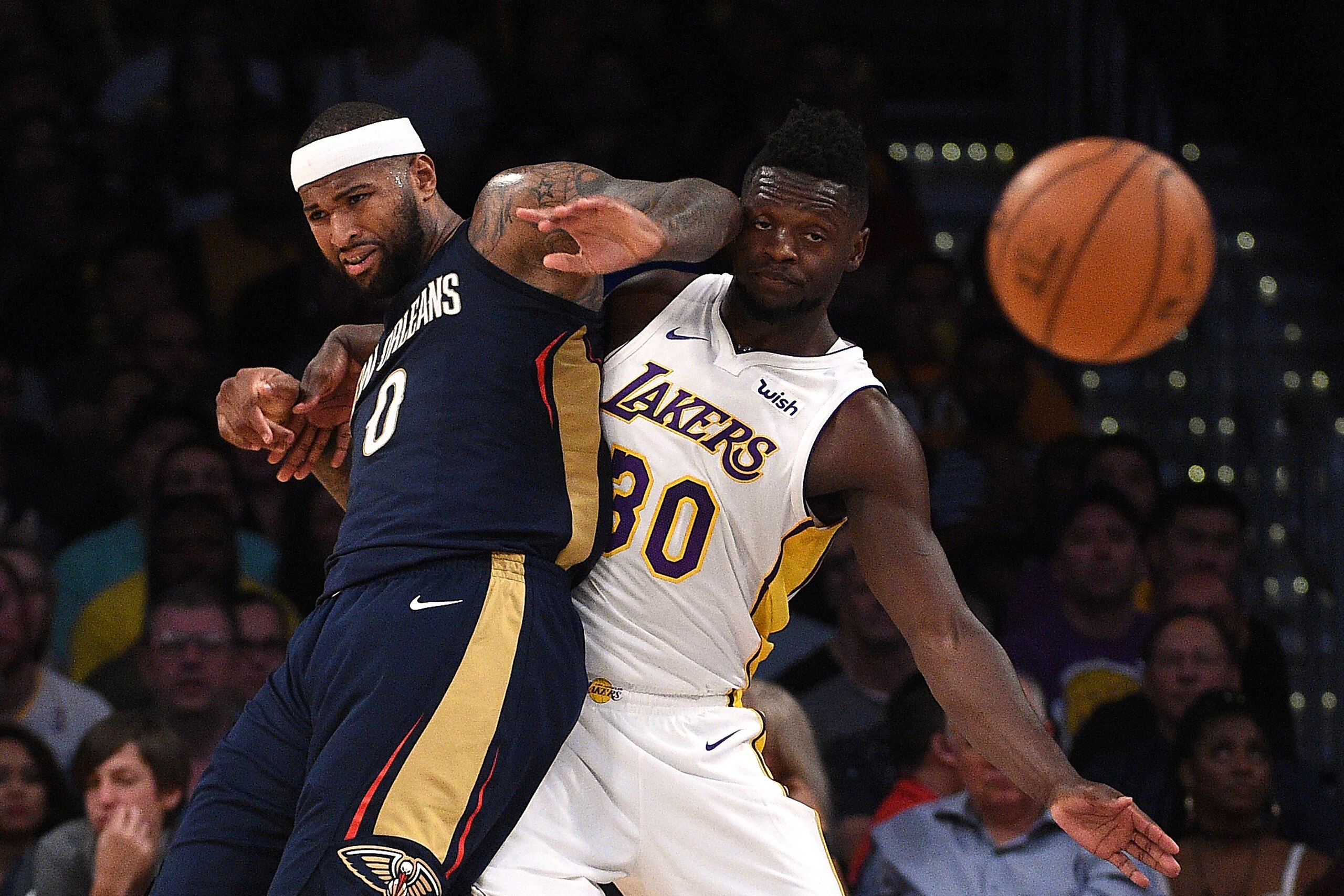 LOS ANGELES, CA - OCTOBER 22: DeMarcus Cousins #0 of the New Orleans Pelicans throws an elbow as he is defended by Julius Randle #30 of the Los Angeles Lakers during the second half against Los Angeles Lakers at Staples Center October 22, 2017 in Los Ange