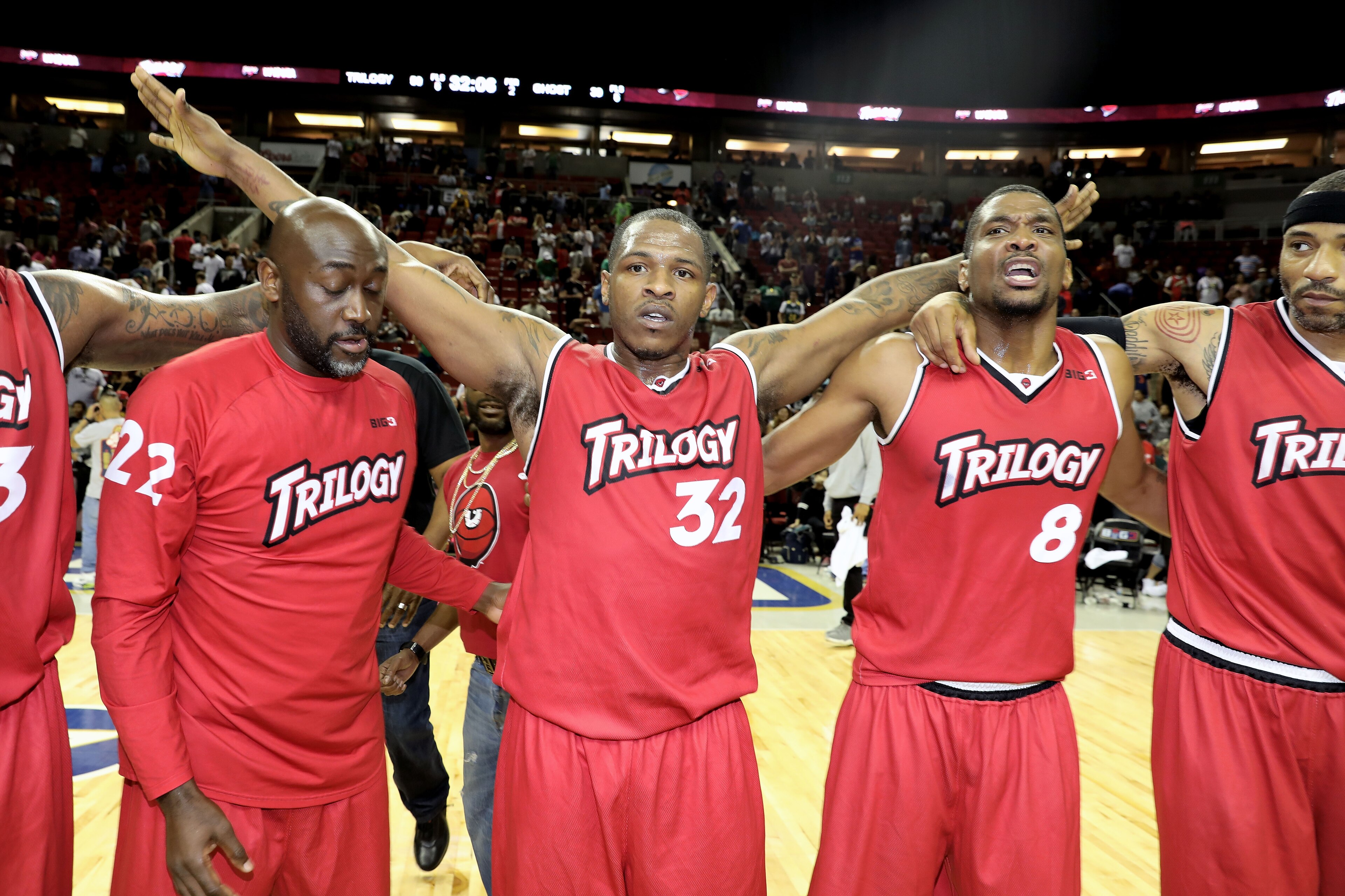 SEATTLE, WA - AUGUST 20:  Dion Glover #22, Rashad McCants #32 and James White #8 of the Trilogy celebrate after winning the semi finals against the Ghost Ballers in week nine of the BIG3 three-on-three basketball league at KeyArena on August 20, 2017 in S