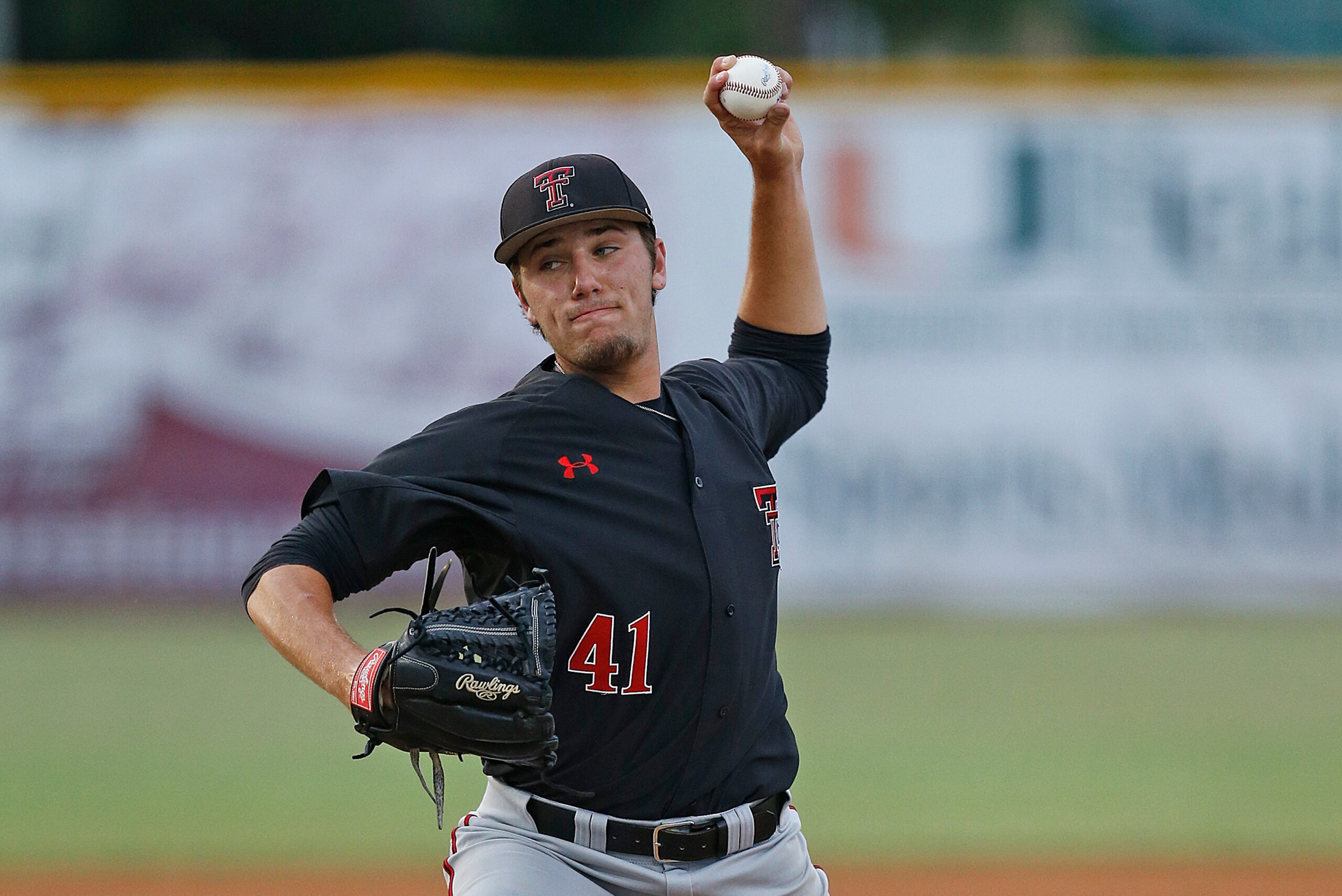 CORAL GABLES, FL - MAY 31: Dylan Dusek #41 of the Texas Tech Red Raiders throws the ball against the Miami Hurricanes during the Coral Gables Regional at the NCAA Baseball Tournament on May 31, 2014 at Alex Rodriguez Park at Mark Light Field in Coral Gabl