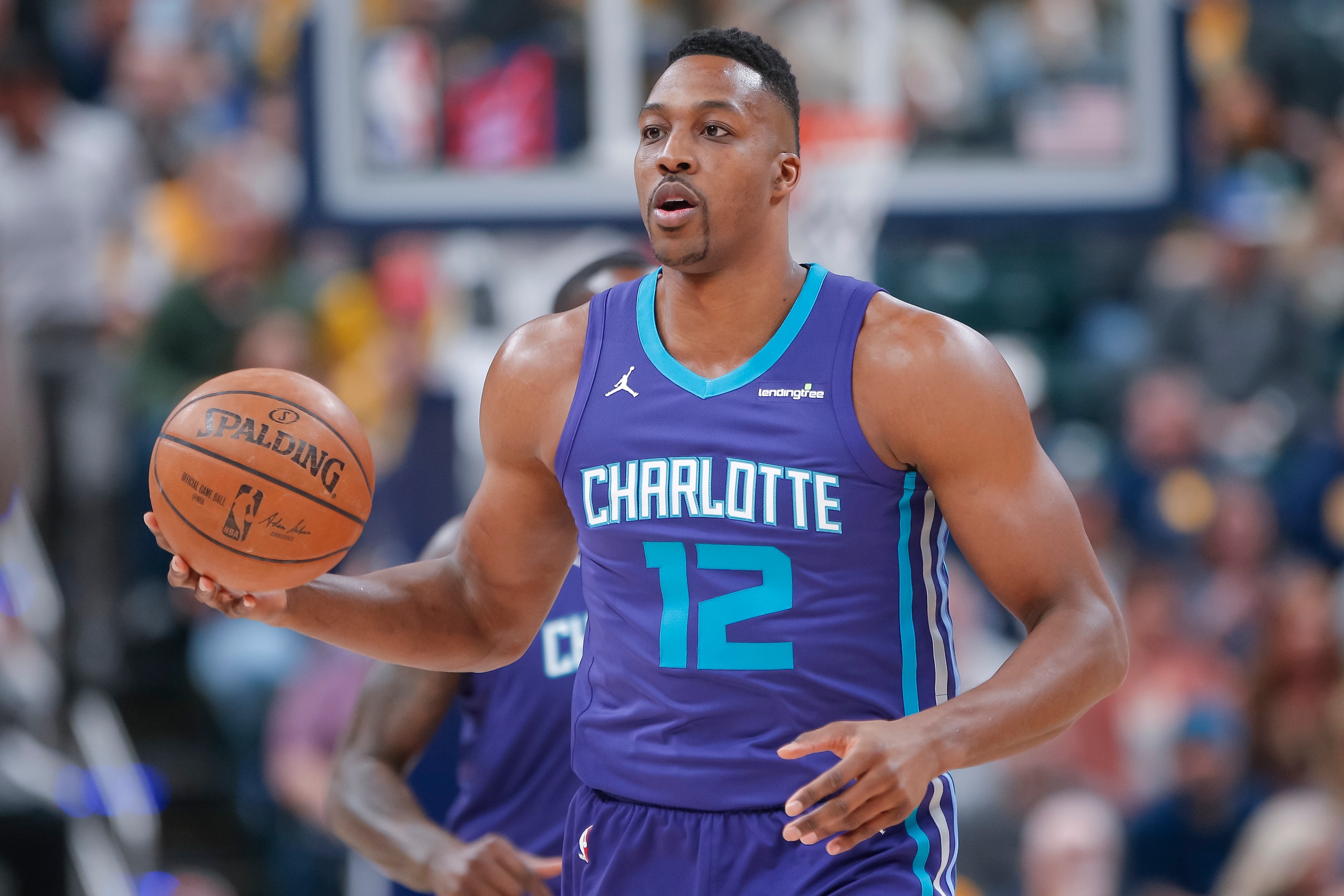 INDIANAPOLIS, IN - APRIL 10: Dwight Howard #12 of the Charlotte Hornets brings the ball up court during the game against the Indiana Pacers at Bankers Life Fieldhouse on April 10, 2018 in Indianapolis, Indiana. NOTE TO USER: User expressly acknowledges an INDIANAPOLIS, IN - APRIL 10: Dwight Howard #12 of the Charlotte Hornets brings the ball up court during the game against the Indiana Pacers at Bankers Life Fieldhouse on April 10, 2018 in Indianapolis, Indiana. NOTE TO USER: User expressly acknowledges an