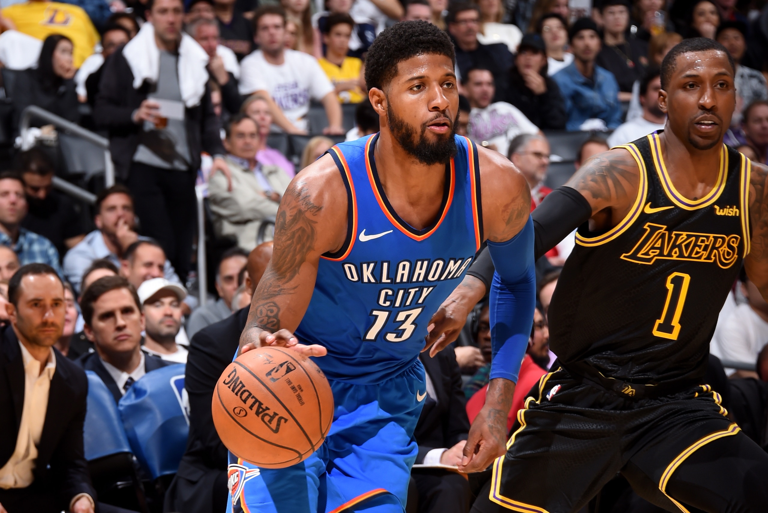 LOS ANGELES, CA - FEBRUARY 8: Paul George #13 of the Oklahoma City Thunder handles the ball during the game against the Los Angeles Lakers on February 8, 2018 at STAPLES Center in Los Angeles, California. NOTE TO USER: User expressly acknowledges and agre