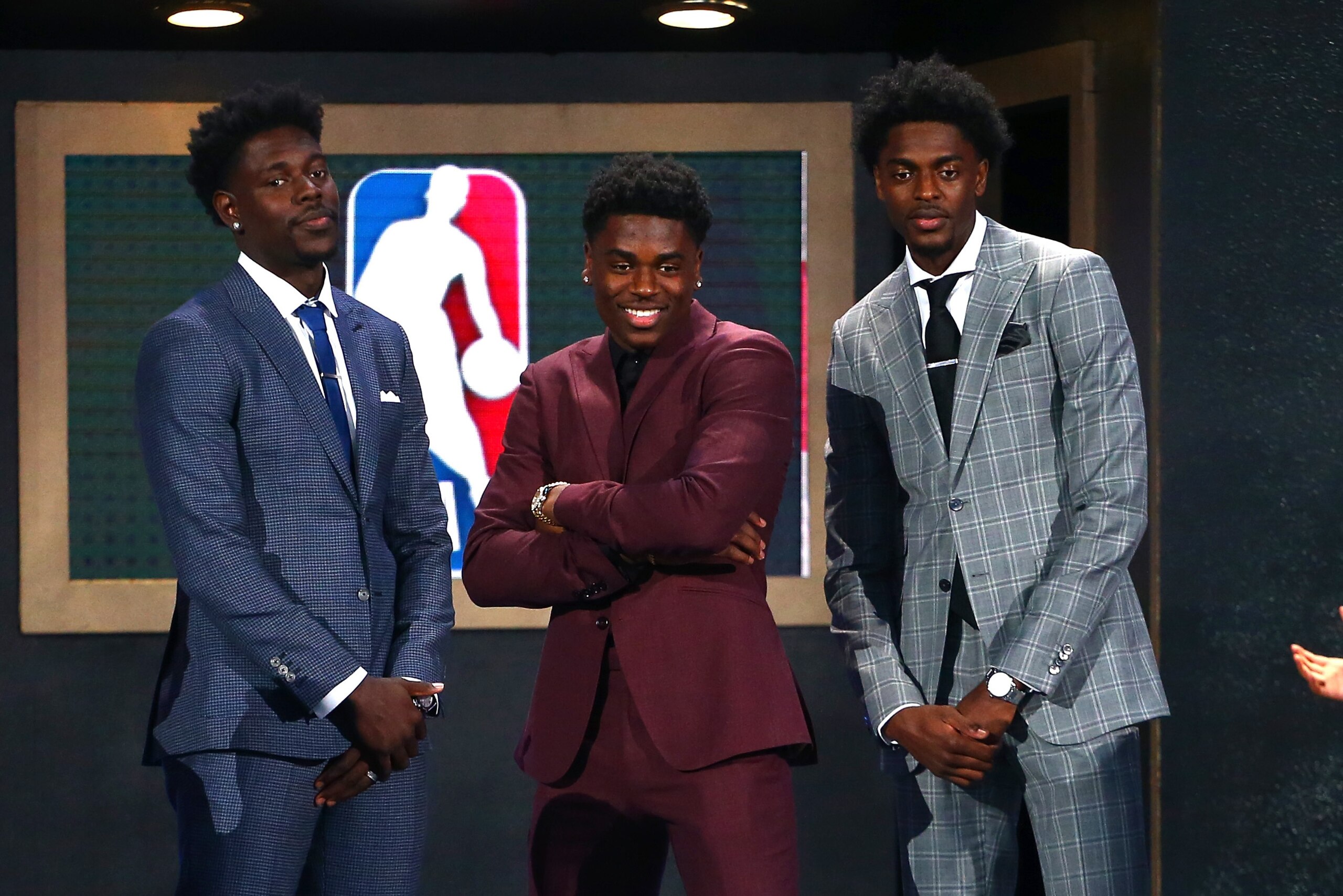 NEW YORK, NY - JUNE 21:  NBA Draft Prospect Aaron Holiday (C) poses with brothers Justin Holiday and Jrue Holiday during the 2018 NBA Draft at the Barclays Center on June 21, 2018 in the Brooklyn borough of New York City. NOTE TO USER: User expressly ackn