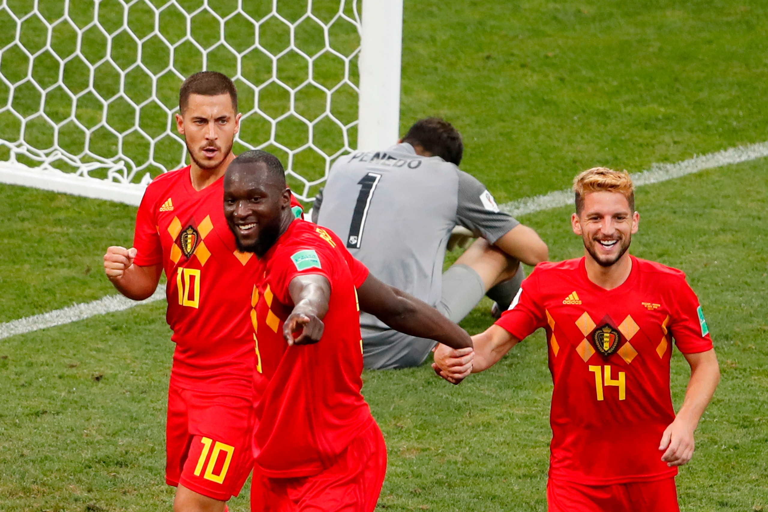 TOPSHOT - Belgium's forward Romelu Lukaku (2nd-L) celebrates his first goal, his team's second, with Belgium's forward Dries Mertens (R) and Belgium's forward Eden Hazard (L) during the Russia 2018 World Cup Group G football match between Belgium and Pana