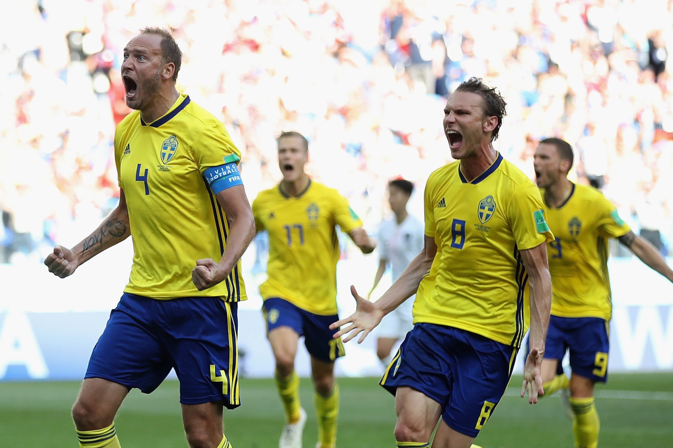 NIZHNIY NOVGOROD, RUSSIA - JUNE 18:  Andreas Granqvist of Sweden (L) celebrates after scoring his team's first goal with team mate Albin Ekdal (R) during the 2018 FIFA World Cup Russia group F match between Sweden and Korea Republic at Nizhniy Novgorod St