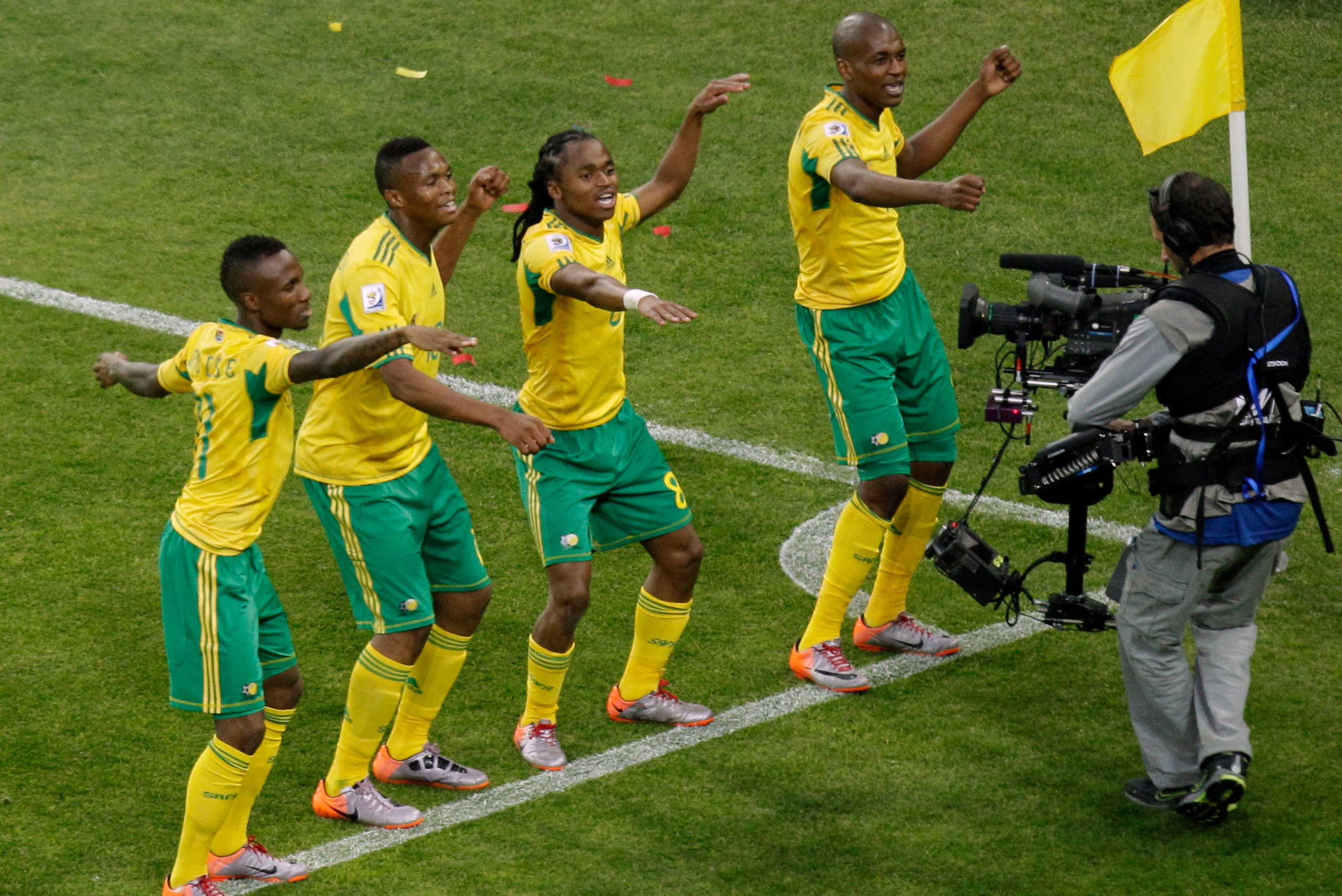 Tshabalala and his team-mates enjoy his goal