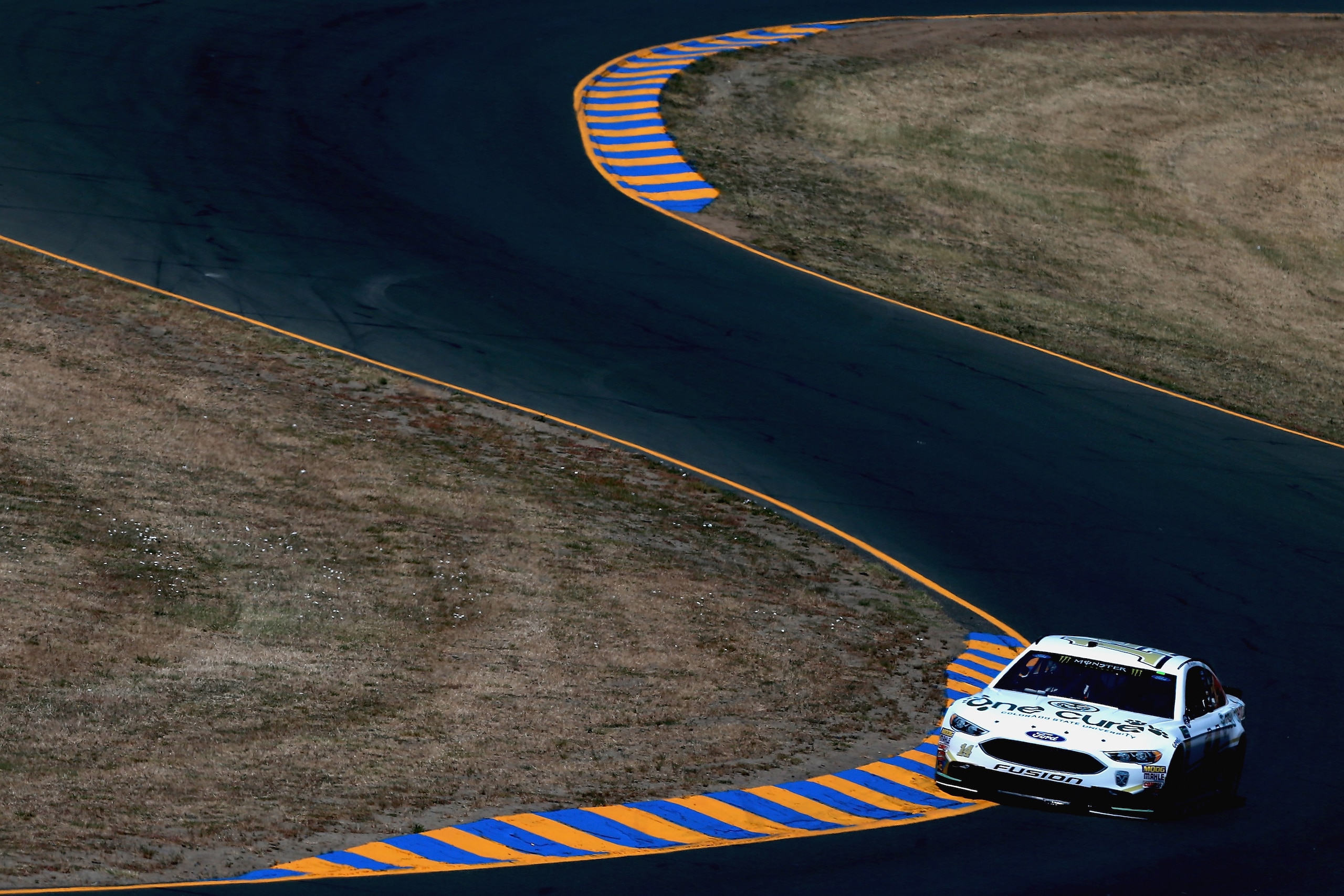 SONOMA, CA - JUNE 22:  Clint Bowyer, driver of the #14 One Cure Ford, practices for the Monster Energy NASCAR Cup Series Toyota/Save Mart 350 at Sonoma Raceway on June 22, 2018 in Sonoma, California.  (Photo by Sean Gardner/Getty Images)