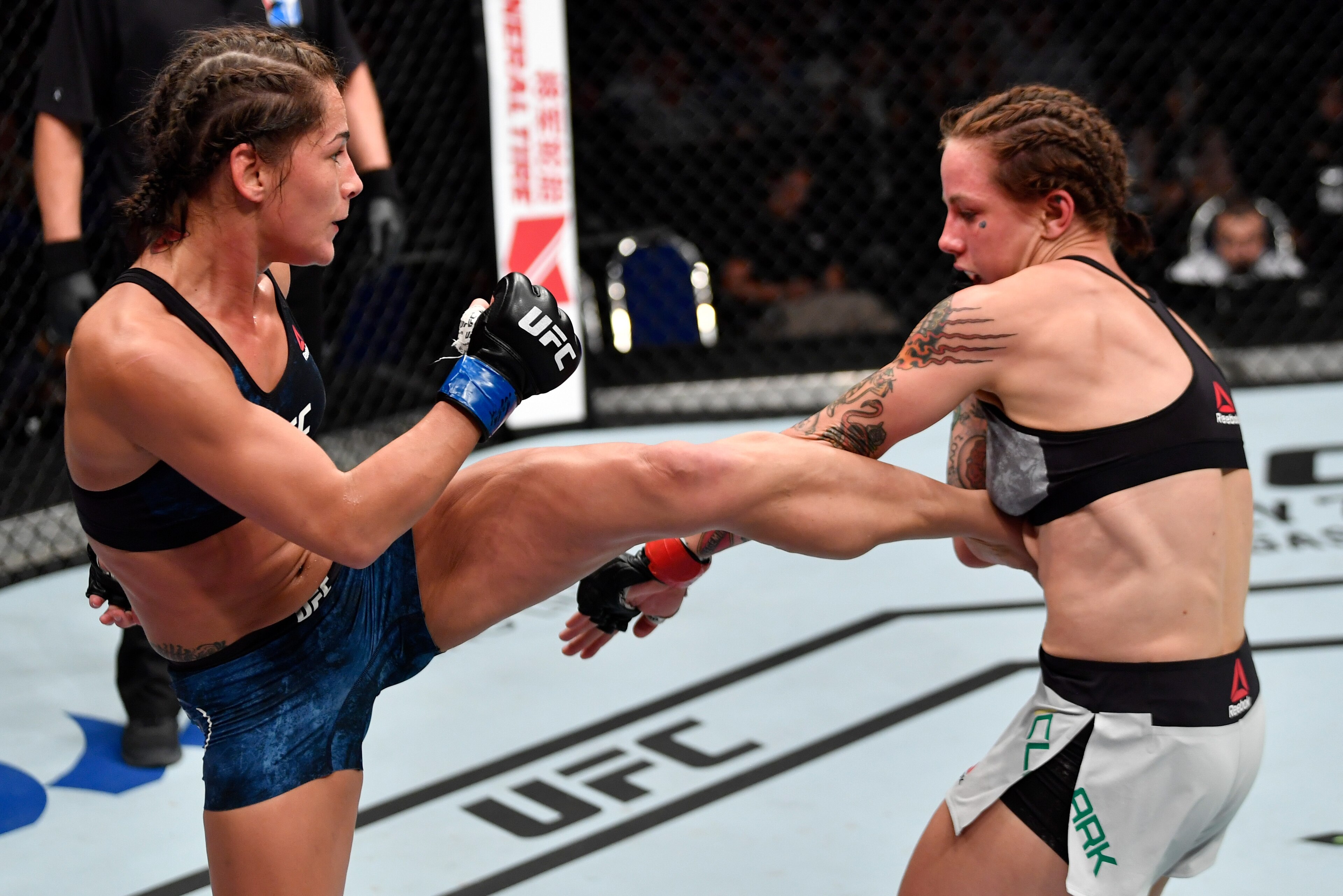SINGAPORE - JUNE 23: (L-R) Jessica Eye kicks Jessica-Rose Clark of Australia in their women's flyweight bout during the UFC Fight Night event at the Singapore Indoor Stadium on June 23, 2018 in Singapore. (Photo by Jeff Bottari/Zuffa LLC/Zuffa LLC via Ge SINGAPORE - JUNE 23: (L-R) Jessica Eye kicks Jessica-Rose Clark of Australia in their women's flyweight bout during the UFC Fight Night event at the Singapore Indoor Stadium on June 23, 2018 in Singapore. (Photo by Jeff Bottari/Zuffa LLC/Zuffa LLC via Ge