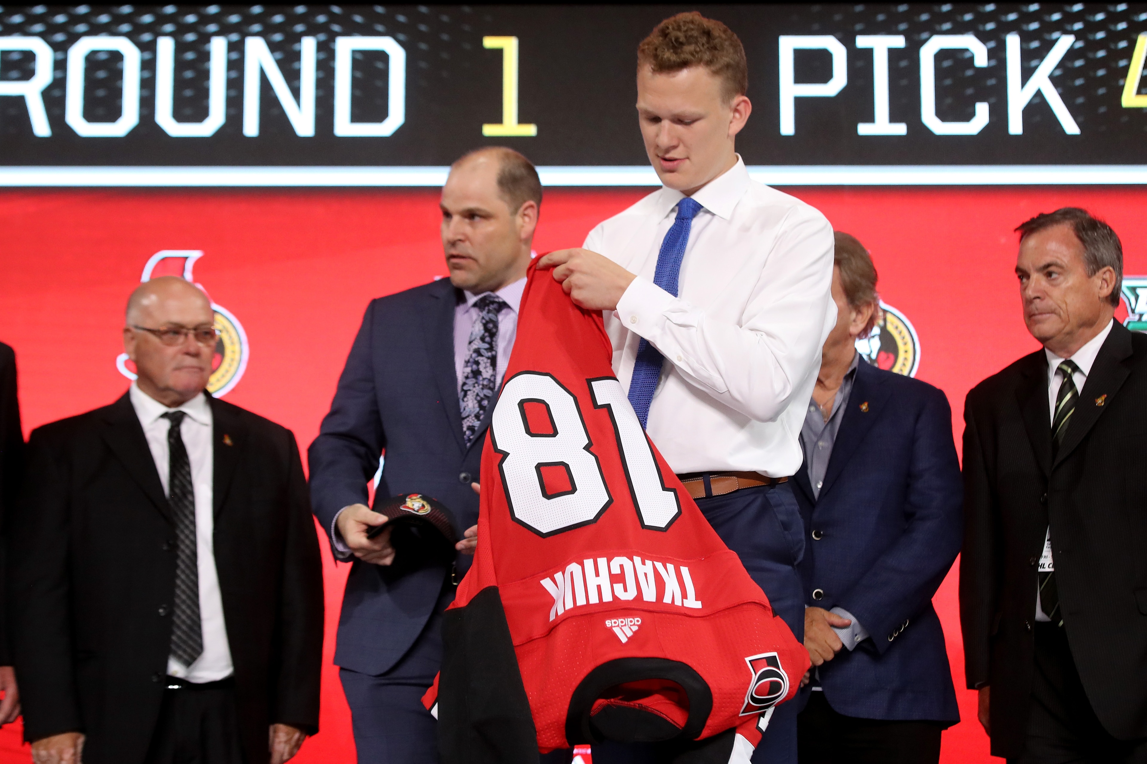 DALLAS, TX - JUNE 22:  Brady Tkachuk reacts after being selected fourth overall by the Ottawa Senators during the first round of the 2018 NHL Draft at American Airlines Center on June 22, 2018 in Dallas, Texas.  (Photo by Bruce Bennett/Getty Images)
