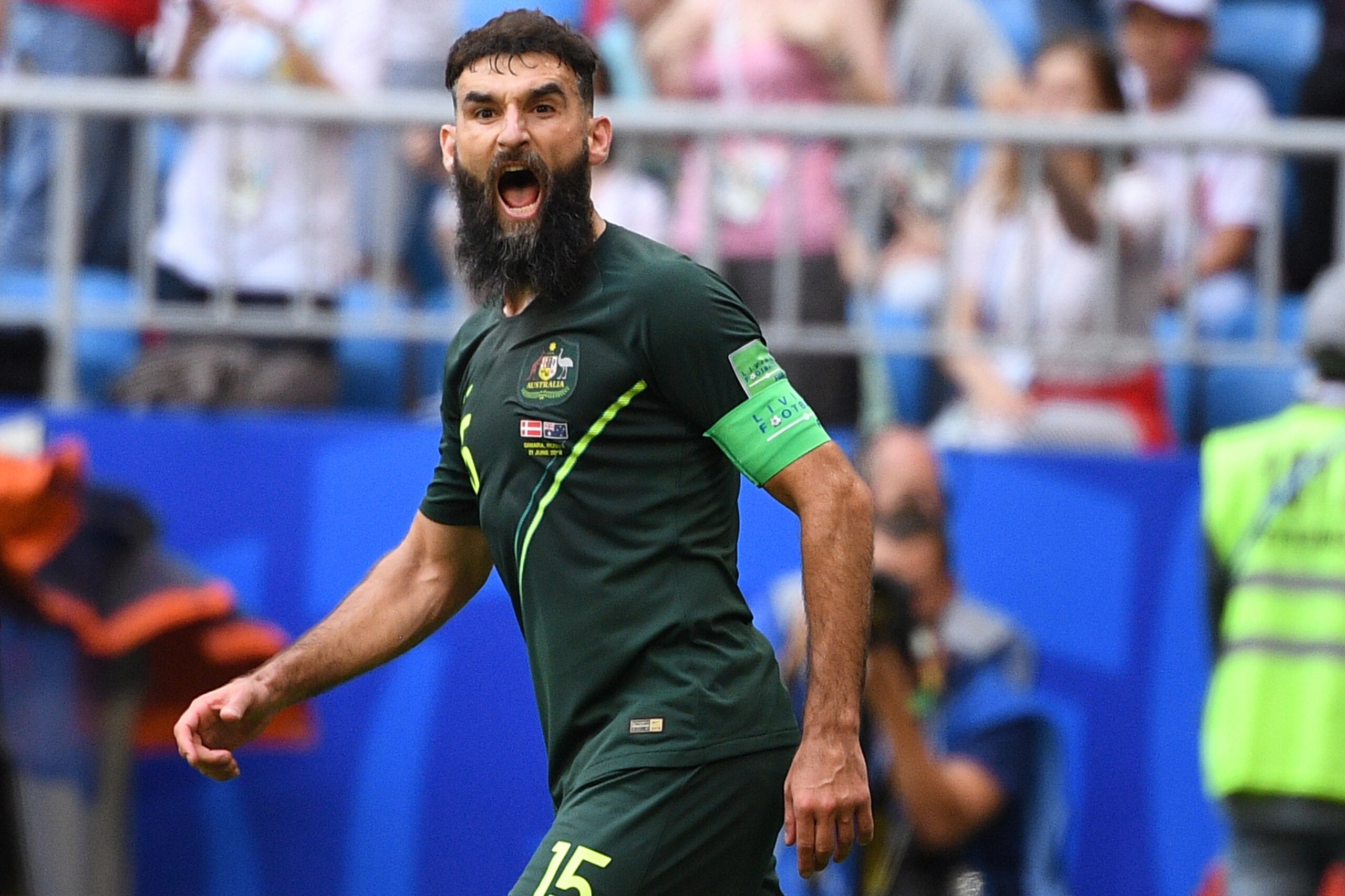 TOPSHOT - Australia's midfielder Mile Jedinak celebrates scoring from the penalty spot for Australia's first goal to equalise 1-1 during the Russia 2018 World Cup Group C football match between Denmark and Australia at the Samara Arena in Samara on June 2