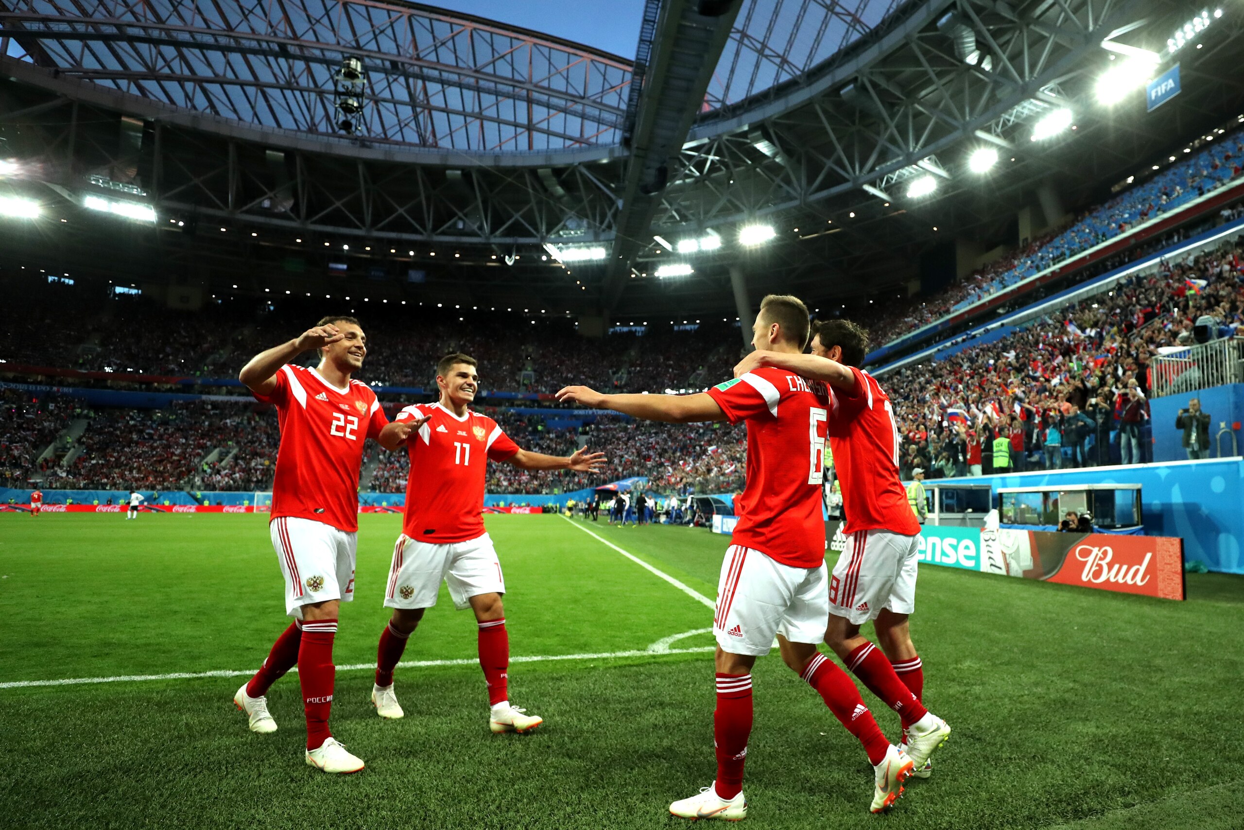 SAINT PETERSBURG, RUSSIA - JUNE 19:  Denis Cheryshev of Russia celebrates with teammates after scoring his team's second goal during the 2018 FIFA World Cup Russia group A match between Russia and Egypt at Saint Petersburg Stadium on June 19, 2018 in Sain