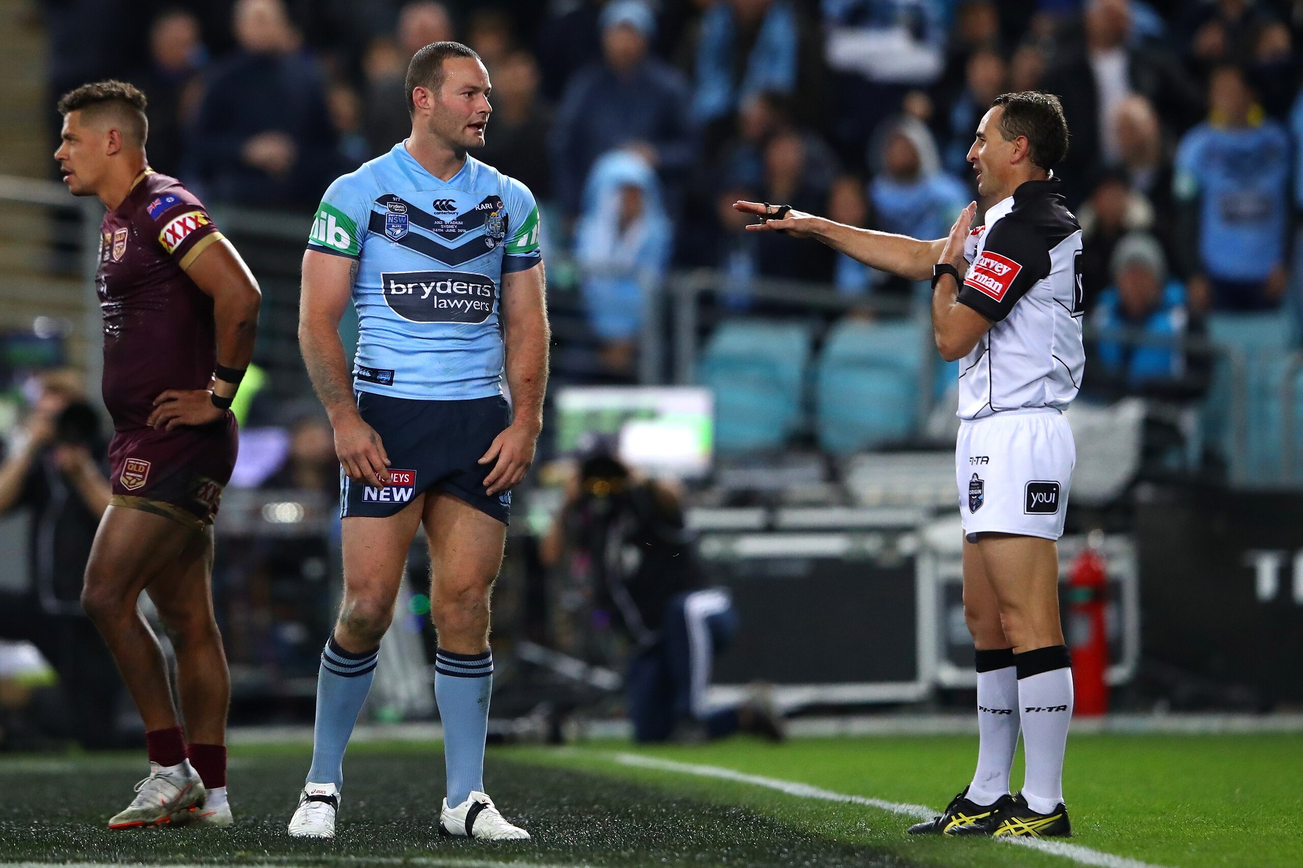 SYDNEY, AUSTRALIA - JUNE 24: Boyd Cordner of the Blues talks to referee Gerard Sutton during game two of the State of Origin series between the New South Wales Blues and the Queensland Maroons at ANZ Stadium on June 24, 2018 in Sydney, Australia.  (Photo 