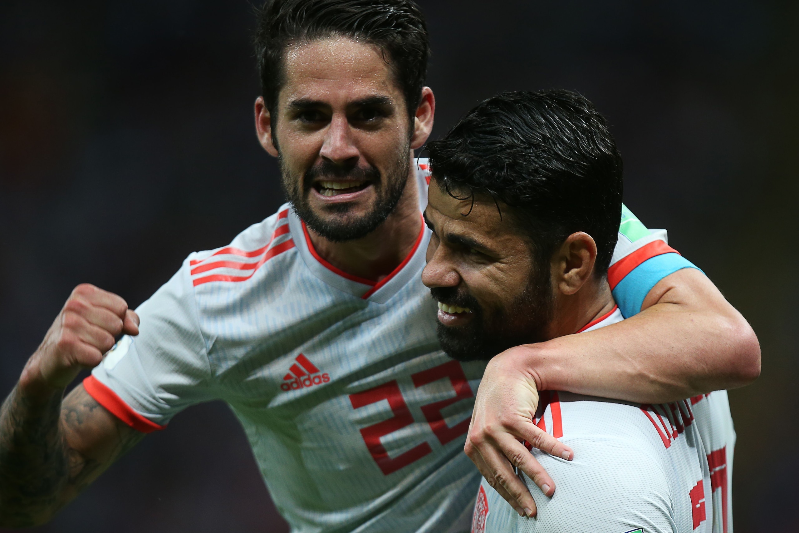 Spain's forward Diego Costa (R) celebrates his goal with midfielder Isco during the Russia 2018 World Cup Group B football match between Iran and Spain at the Kazan Arena in Kazan on June 20, 2018. (Photo by Roman Kruchinin / AFP) / RESTRICTED TO EDITORIA Spain's forward Diego Costa (R) celebrates his goal with midfielder Isco during the Russia 2018 World Cup Group B football match between Iran and Spain at the Kazan Arena in Kazan on June 20, 2018. (Photo by Roman Kruchinin / AFP) / RESTRICTED TO EDITORIA