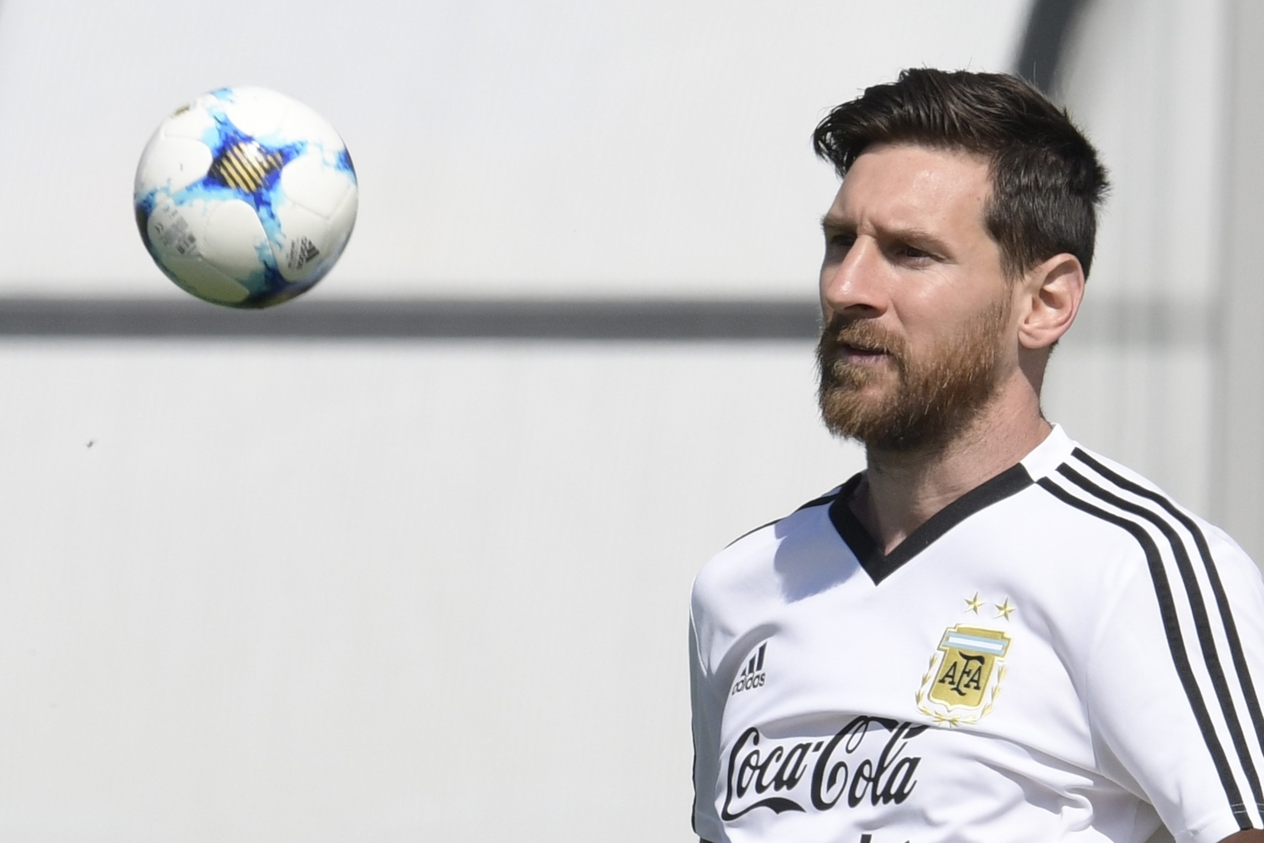 Argentina's forward Lionel Messi eyes a small ball during a training session at the team's base camp in Bronnitsy, on June 25, 2018 on the eve of the team's third game as part of the Russia 2018 World Cup Group D football match. (Photo by JUAN MABROMATA /