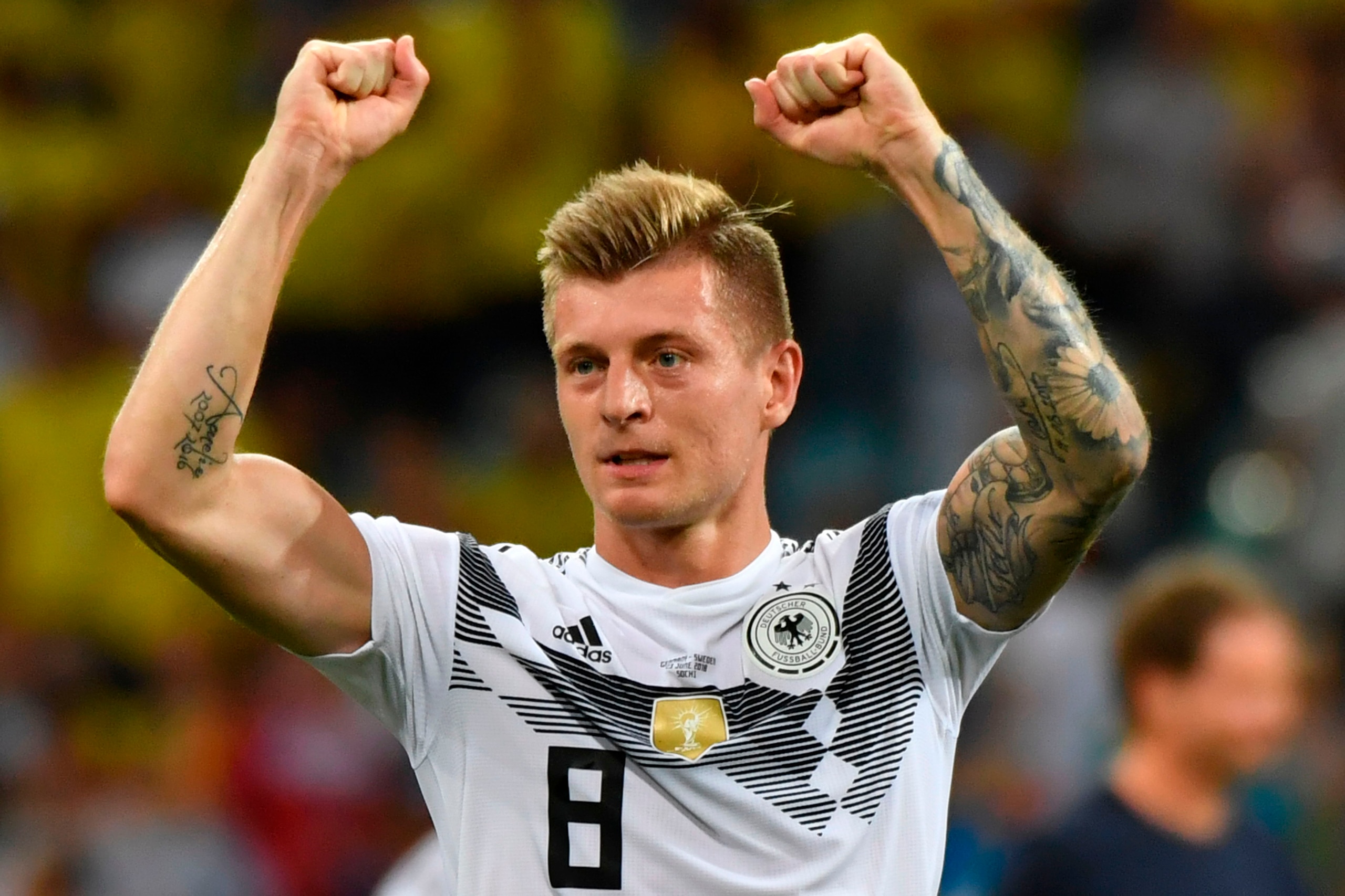 Germany's midfielder Toni Kroos celebrates scoring the 2-1 goal with his teammates during the Russia 2018 World Cup Group F football match between Germany and Sweden at the Fisht Stadium in Sochi on June 23, 2018. (Photo by Nelson Almeida / AFP) / RESTRIC