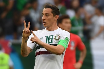 Mexico's midfielder Andres Guardado celebrates after Mexico's forward Carlos Vela scored a penalty for the opening goal during the Russia 2018 World Cup Group F football match between South Korea and Mexico at the Rostov Arena in Rostov-On-Don on June 23,