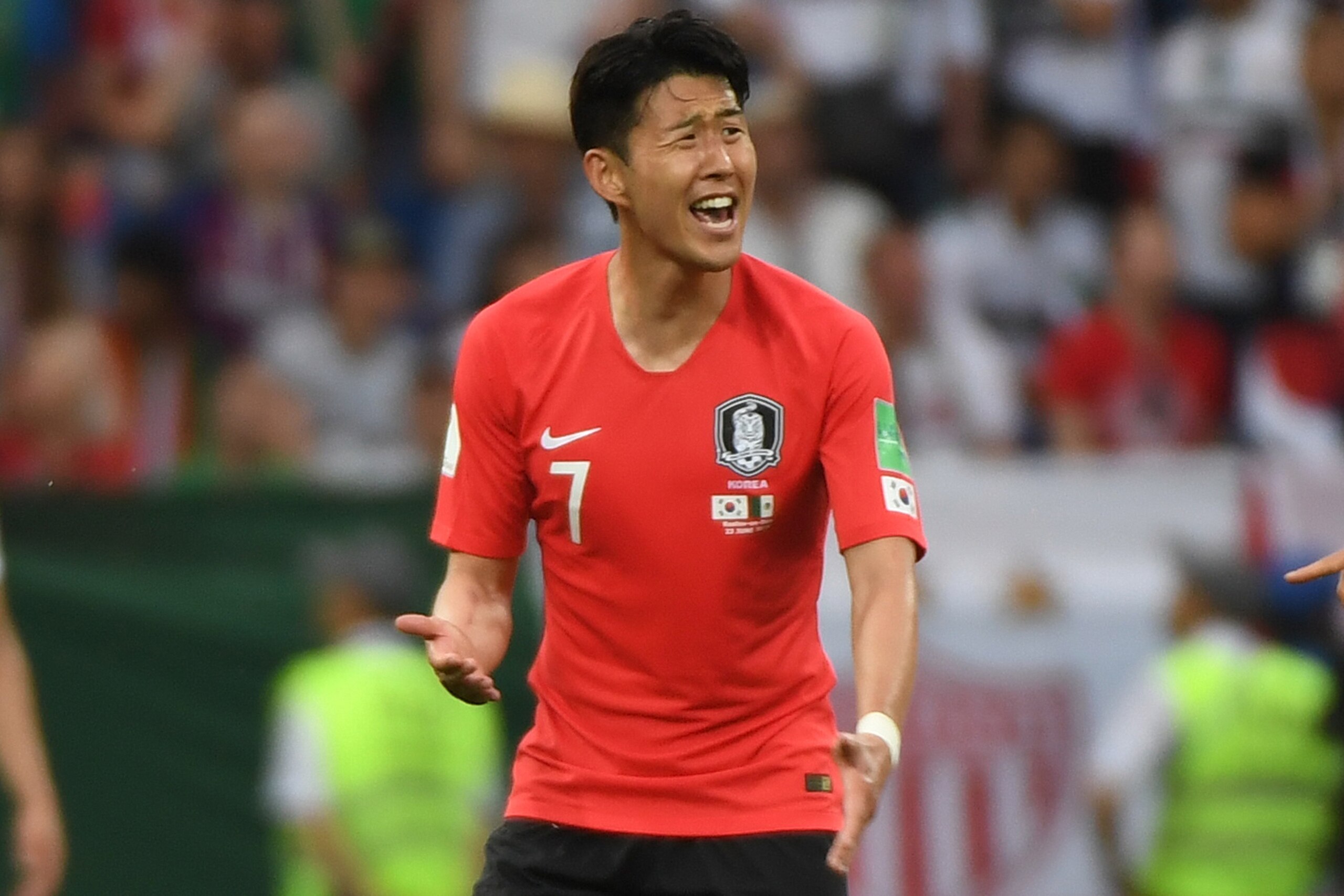 TOPSHOT - South Korea's forward Son Heung-min reacts after scoring their first goal during the Russia 2018 World Cup Group F football match between South Korea and Mexico at the Rostov Arena in Rostov-On-Don on June 23, 2018. (Photo by Khaled DESOUKI / AF