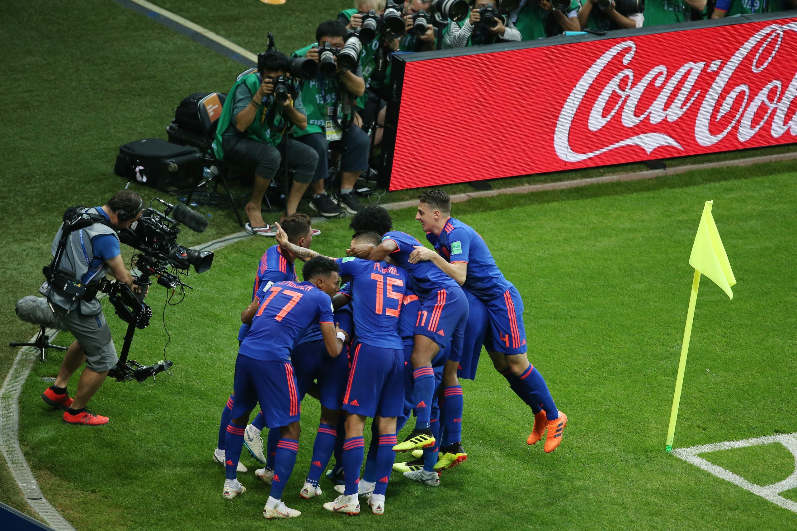 Colombia's players celebrate after scoring their second goal during the Russia 2018 World Cup Group H football match between Poland and Colombia at the Kazan Arena in Kazan on June 24, 2018. (Photo by Roman Kruchinin / AFP) / RESTRICTED TO EDITORIAL USE -