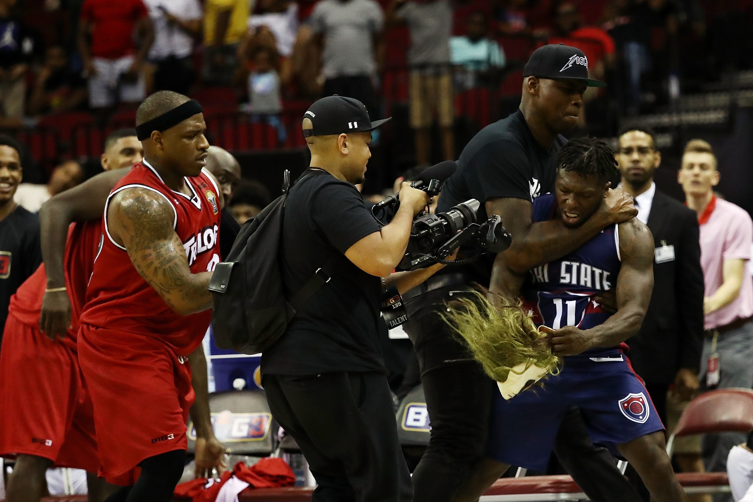 HOUSTON, TX - JUNE 22:  Rashad McCants #32 of Trilogy and Nate Robinson #11 of Tri State argue after the game during week one of the BIG3 three on three basketball league at Toyota Center on June 22, 2018 in Houston, Texas.  (Photo by Ronald Martinez/BIG3