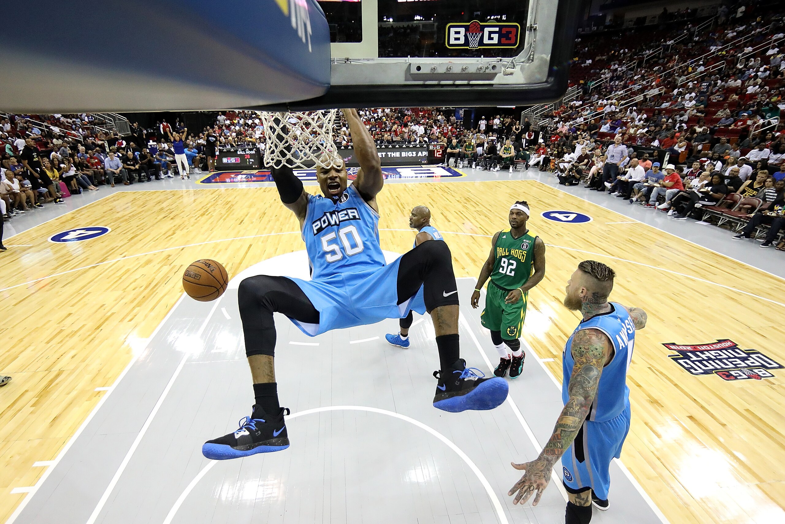 HOUSTON, TX - JUNE 22: Corey Maggette #50 of Power reacts after a dunk during a game against Ball Hogs during week one of the BIG3 three on three basketball league at Toyota Center on June 22, 2018 in Houston, Texas.  (Photo by Ronald Martinez/BIG3/Getty 