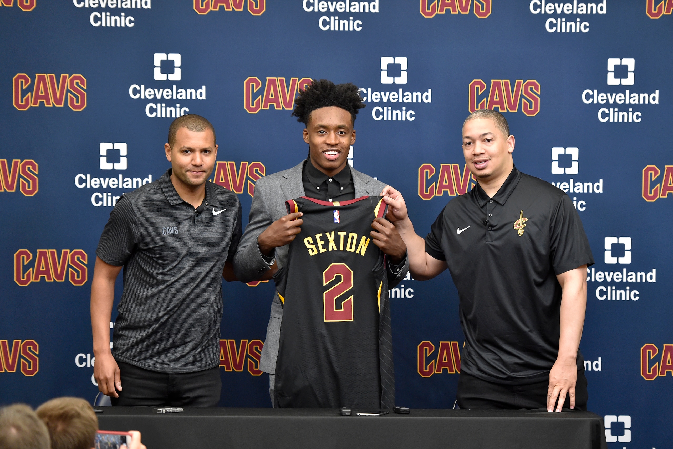 INDEPENDENCE, OH - JUNE 22: General manager Koby Altman and head coach Tyronn Lue of the Cleveland Cavaliers pose for a photo with Collin Sexton during a press conference on June 22, 2018 at the Cleveland Clinic Courts in Independence, Ohio. NOTE TO USER: