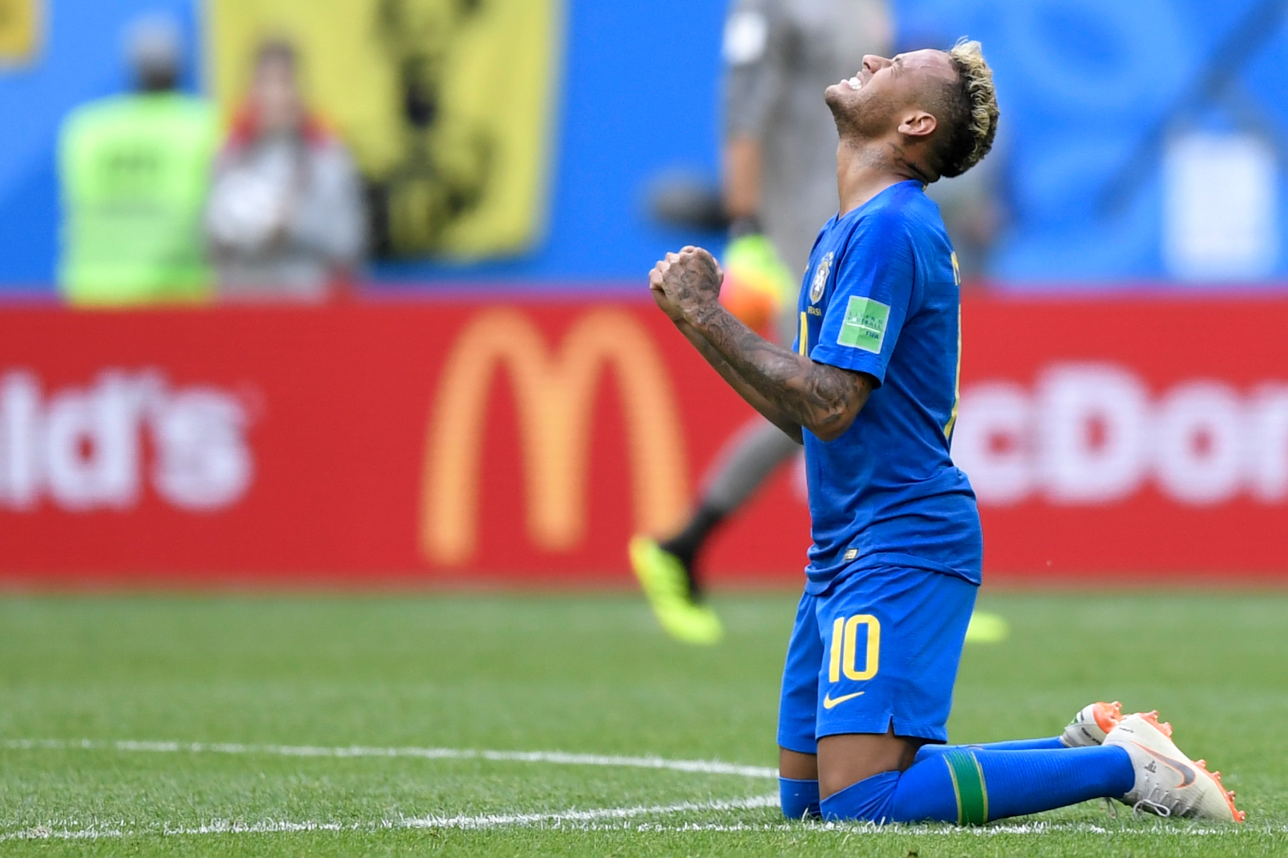 Brazil's forward Neymar reacts after scoring his goal during the Russia 2018 World Cup Group E football match between Brazil and Costa Rica at the Saint Petersburg Stadium in Saint Petersburg on June 22, 2018. (Photo by GABRIEL BOUYS / AFP) / RESTRICTED T
