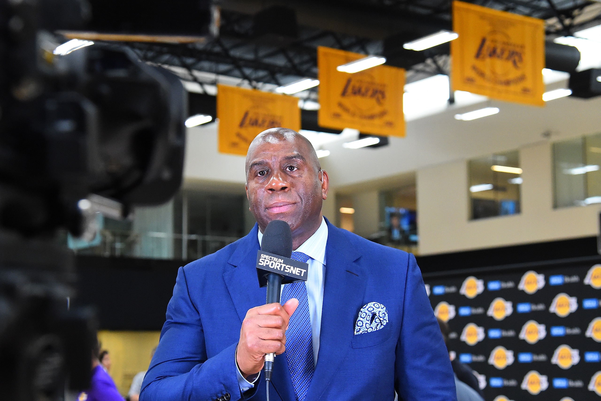 EL SEGUNDO, CA - JUNE 26:  President of basketball operations Magic Johnson answers question from the media during a press conference to introduce the team's 2018 NBA draft picks at the UCLA Health Training Center on June 26, 2018 in El Segundo, Californi