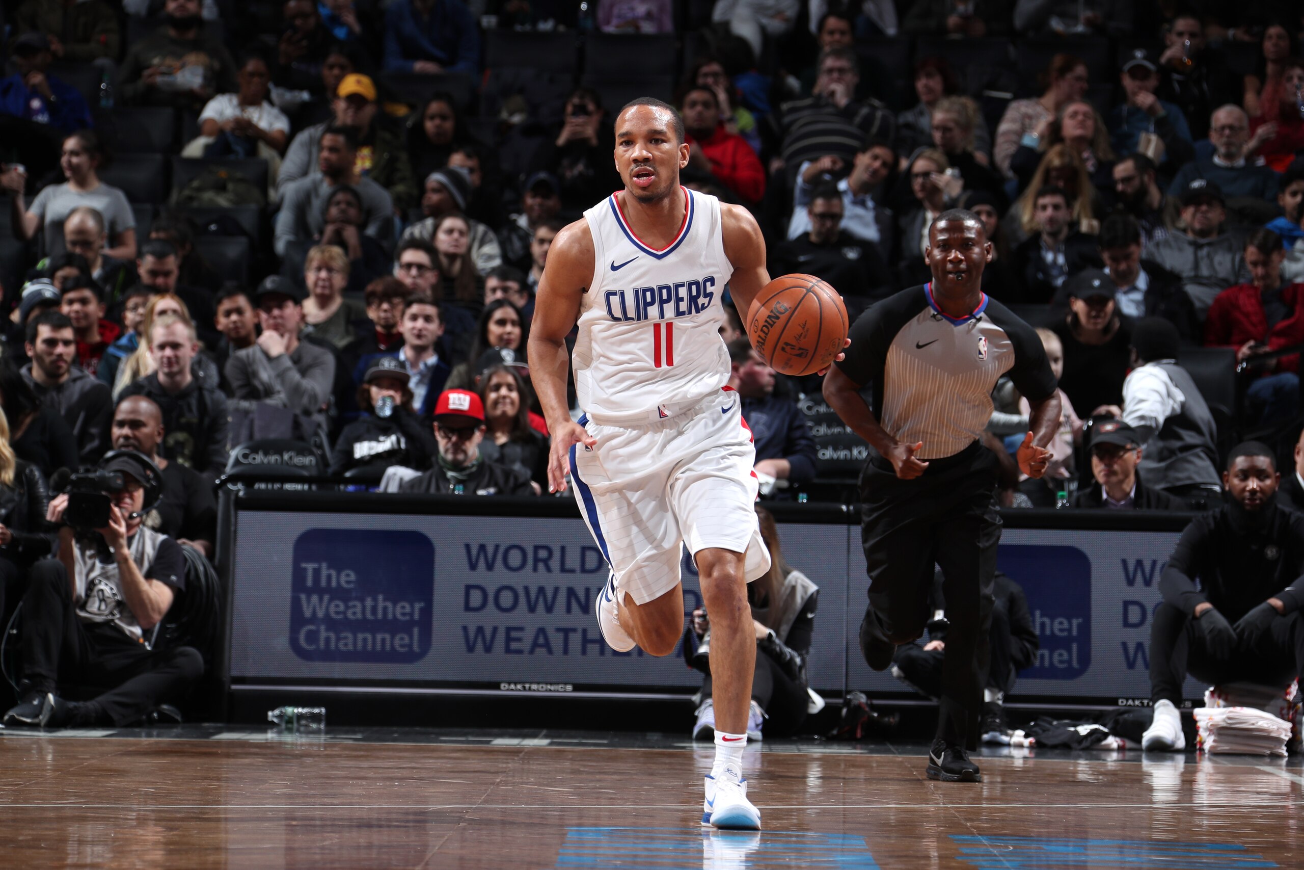 BROOKLYN, NY - FEBRUARY 12:  Avery Bradley #11 of the LA Clippers brings the ball up court against the Brooklyn Nets on February 12, 2018 at Barclays Center in Brooklyn, New York. NOTE TO USER: User expressly acknowledges and agrees that, by downloading a