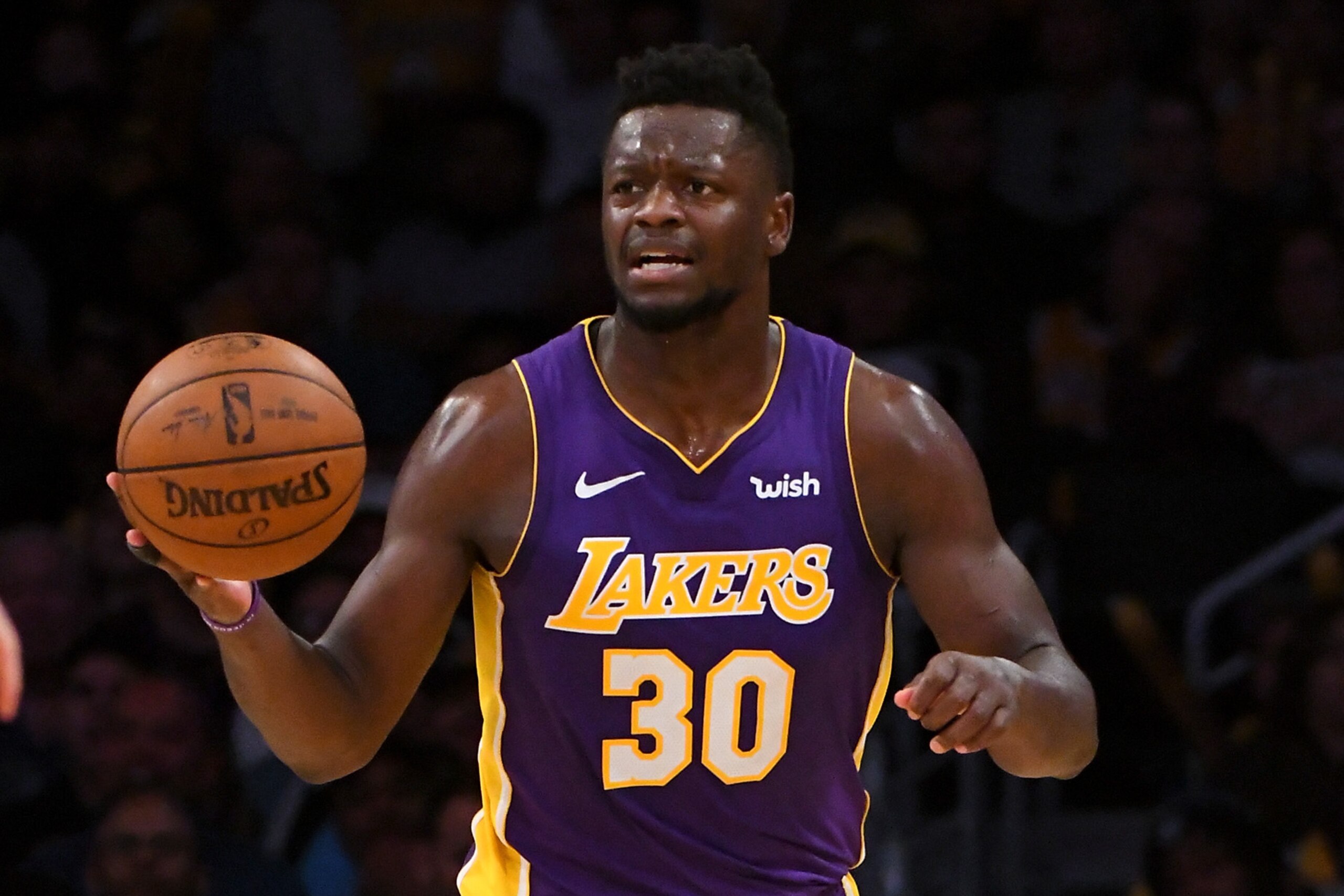 LOS ANGELES, CA - MARCH 28:  Julius Randle #30 of the Los Angeles Lakers takes the ball down court in the game against the Dallas Mavericks at Staples Center on March 28, 2018 in Los Angeles, California.  (Photo by Jayne Kamin-Oncea/Getty Images)  NOTE TO