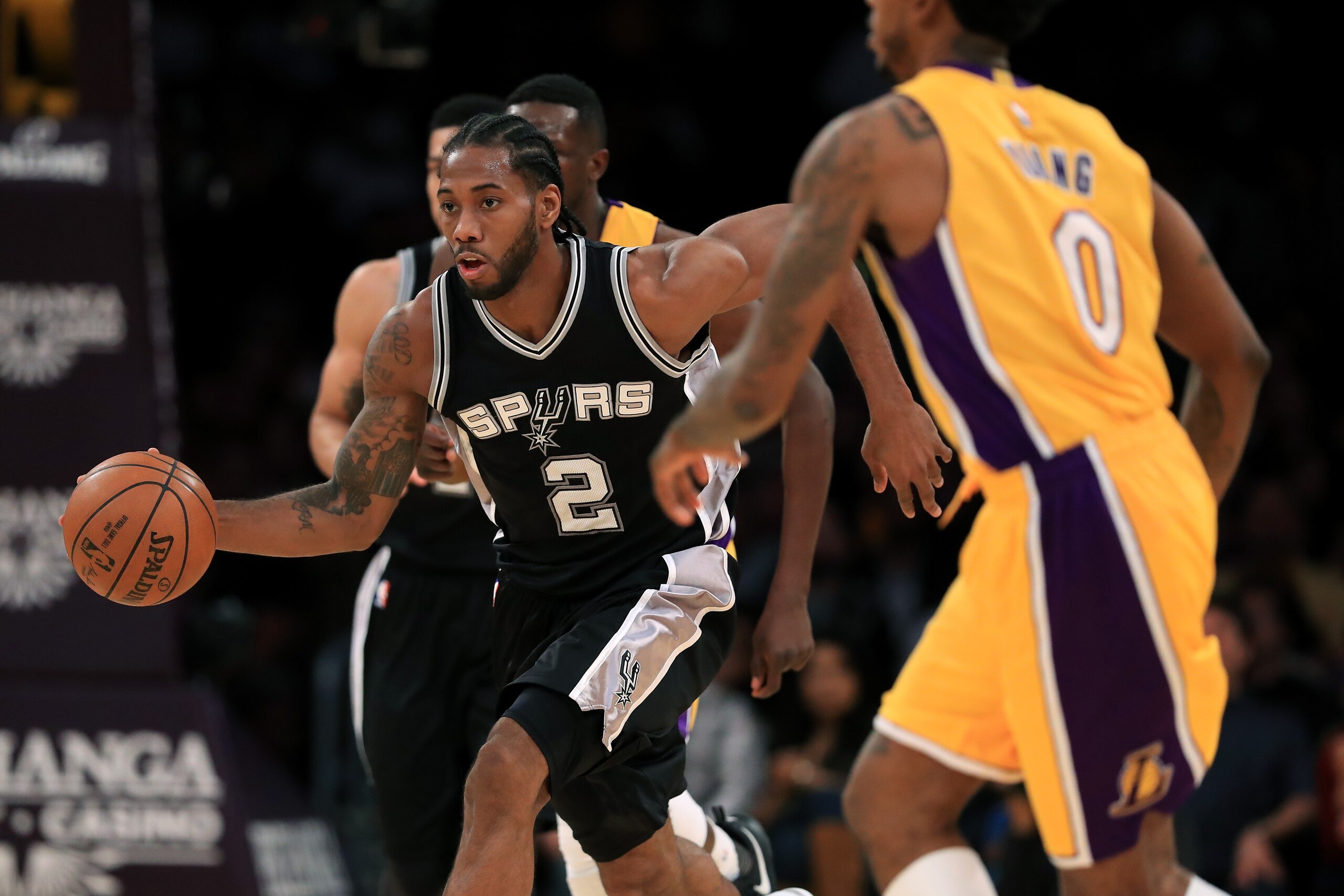 LOS ANGELES, CA - NOVEMBER 18:  Kawhi Leonard #2 of the San Antonio Spurs dribbles upcourt during the second half of a game against the Los Angeles Lakers at Staples Center on November 18, 2016 in Los Angeles, California. NOTE TO USER: User expressly ackn