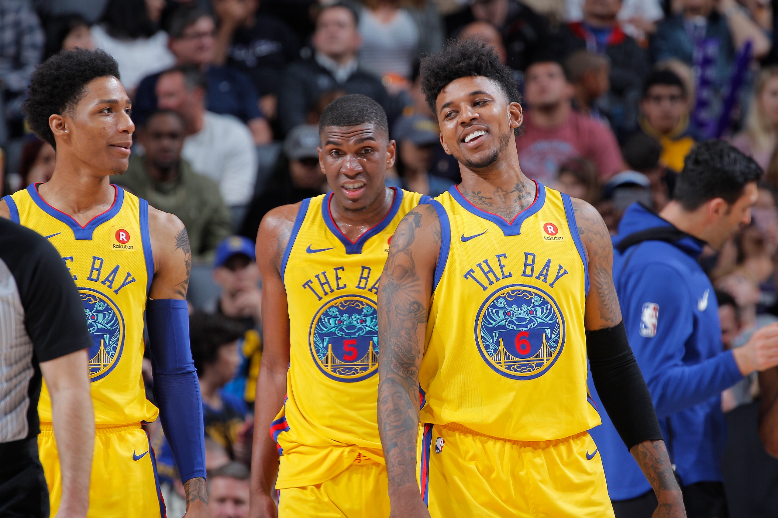 SACRAMENTO, CA - MARCH 31: Patrick McCaw #0, Kevon Looney #5 and Nick Young #6 of the Golden State Warriors face the Sacramento Kings on March 31, 2018 at Golden 1 Center in Sacramento, California. NOTE TO USER: User expressly acknowledges and agrees that